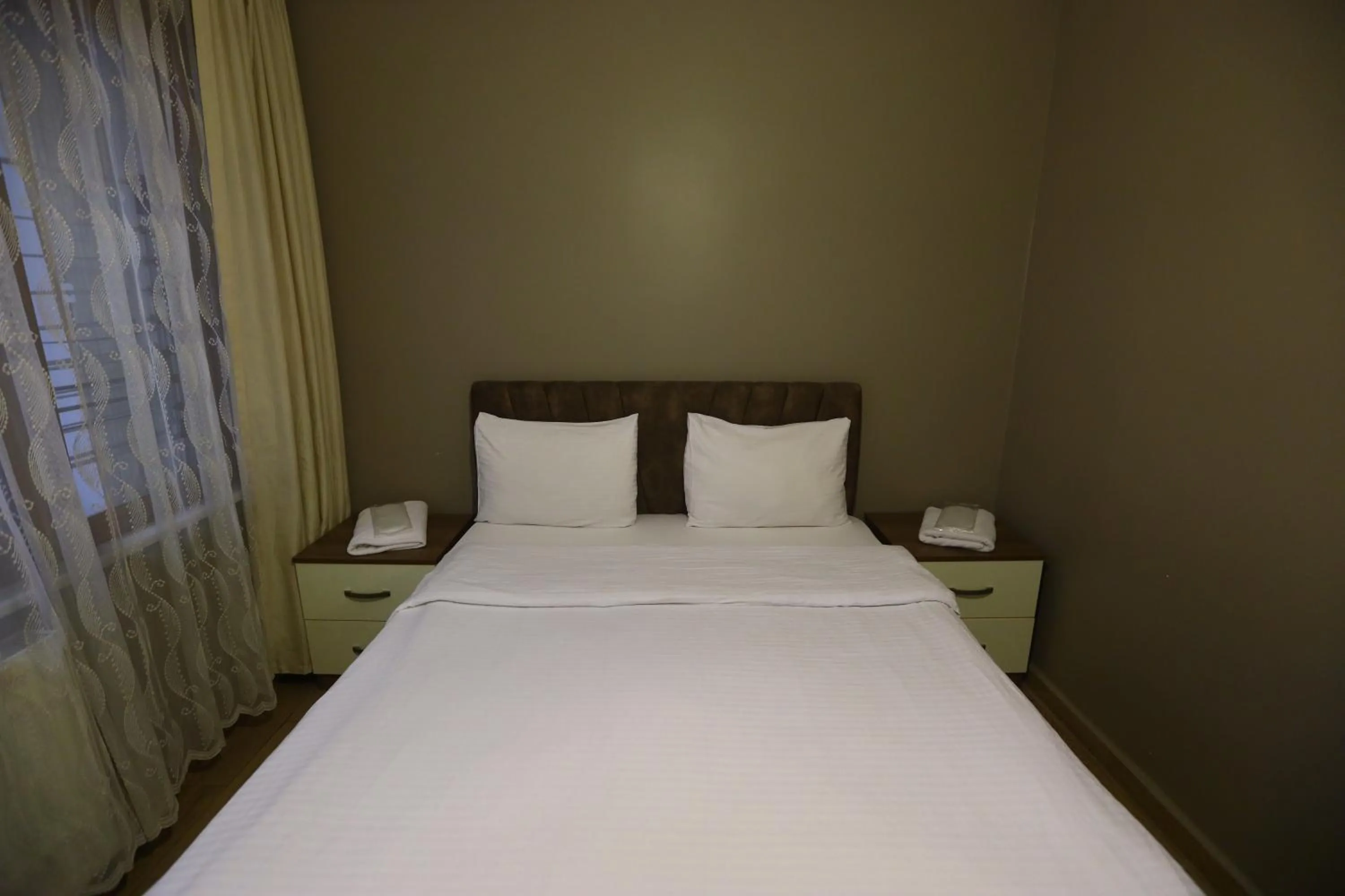 Bedroom, Bed in Zendy Suite Hotel