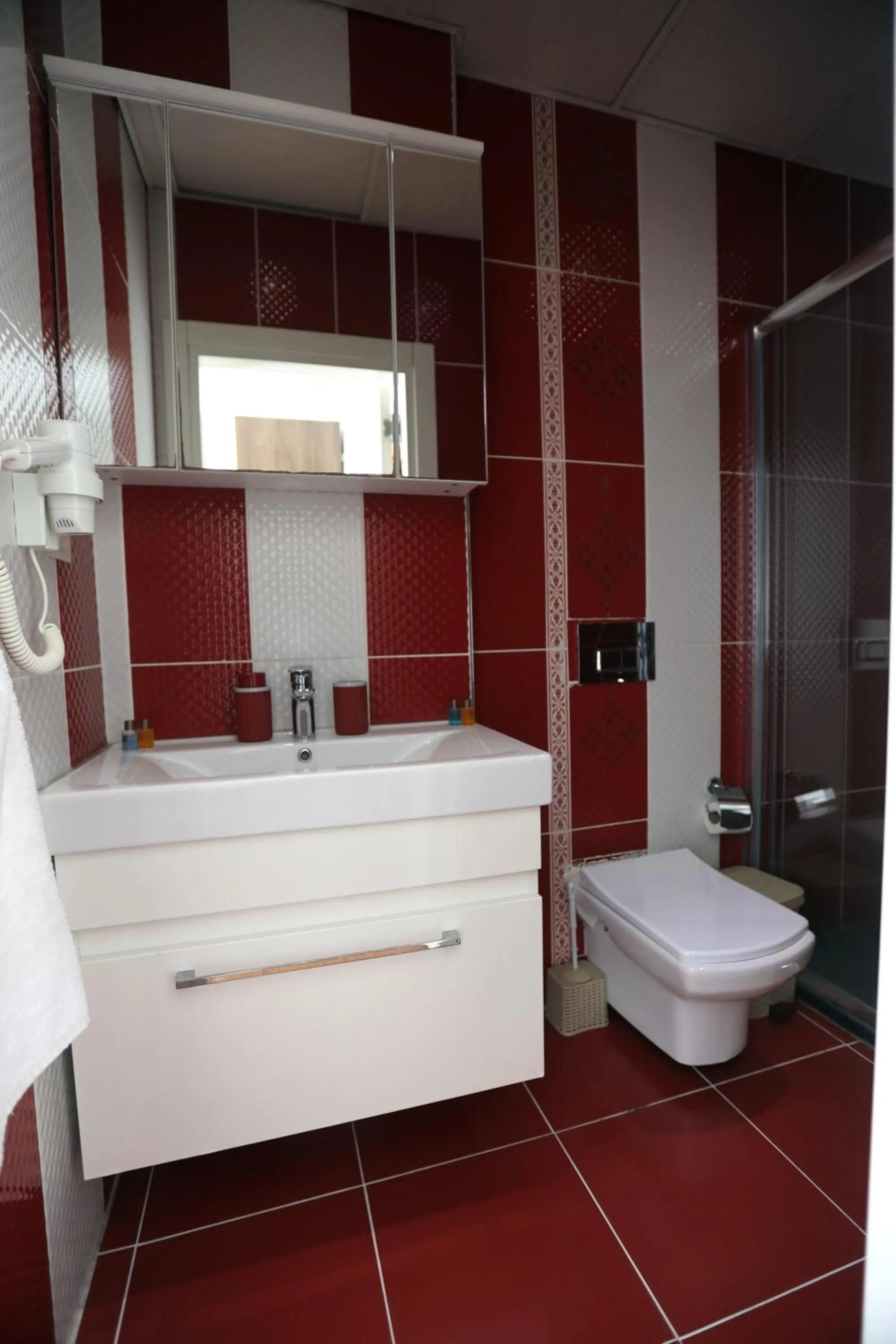 Bathroom in Zendy Suite Hotel