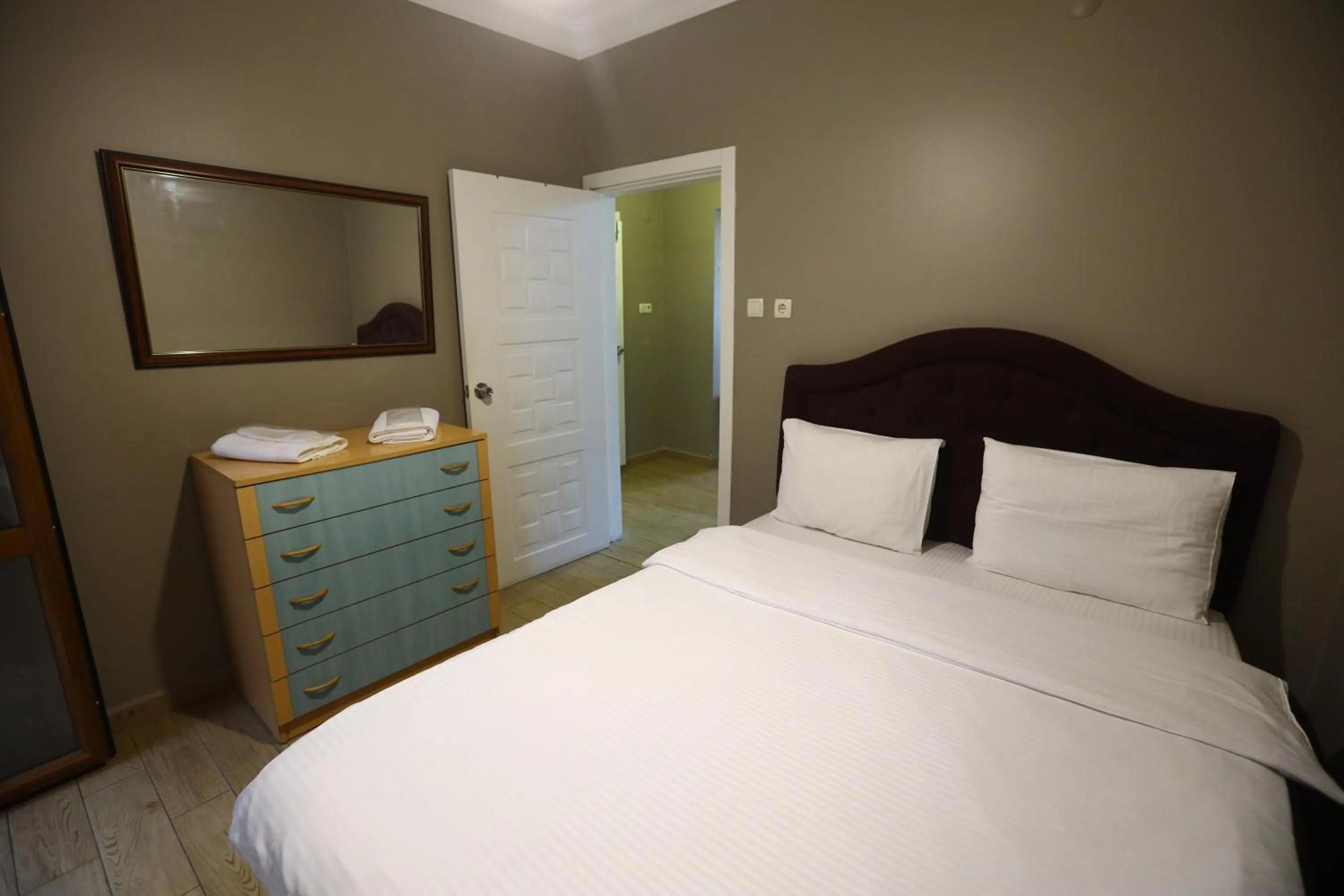 Bedroom, Bed in Zendy Suite Hotel