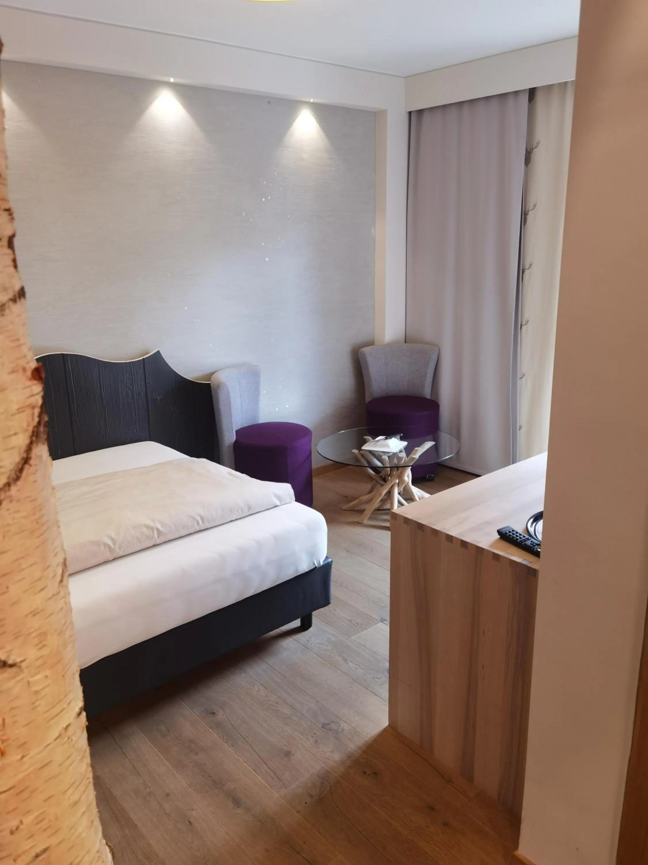 Seating area, Bed in Verwöhn-Wellnesshotel Walserhof