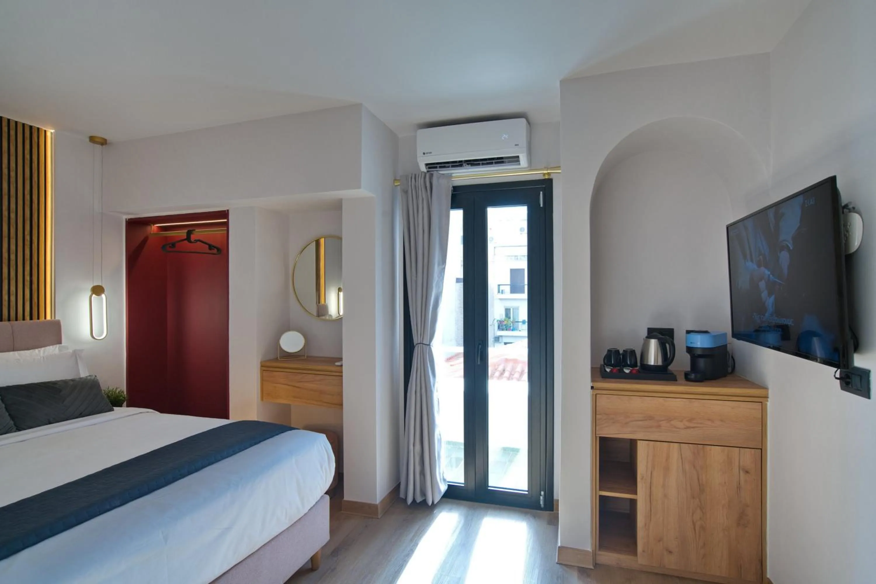 Bed in CITYLUXE Suites & Rooms