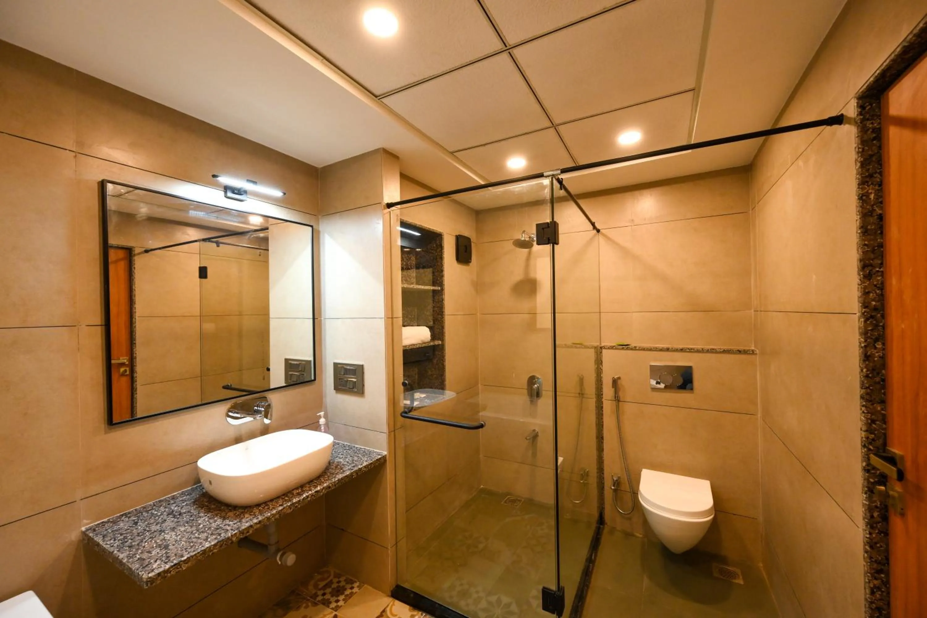 Toilet in E&G Green Courts Resort at Koroli Hill Station