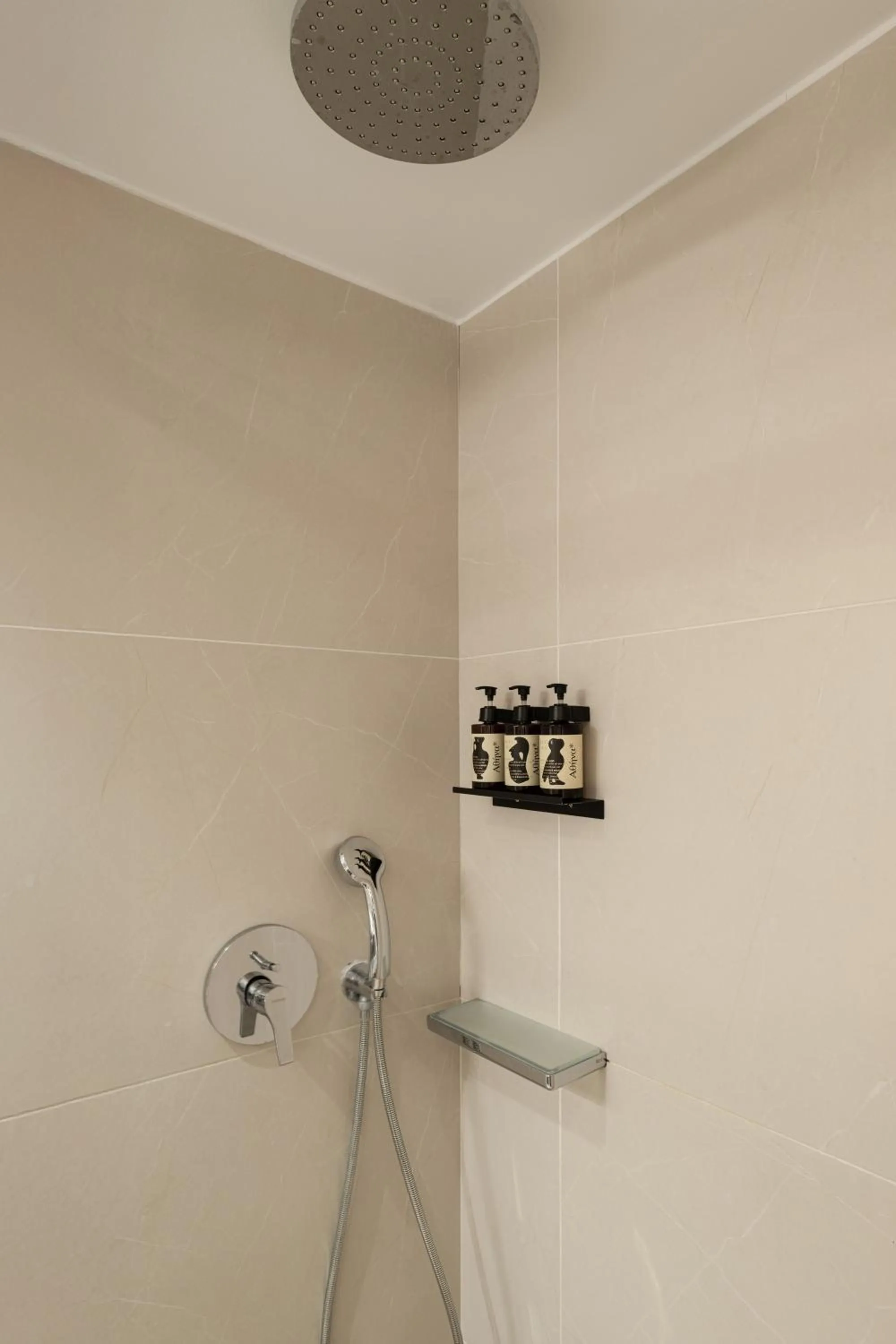 Shower in ASTIKON Xenofontos Suites