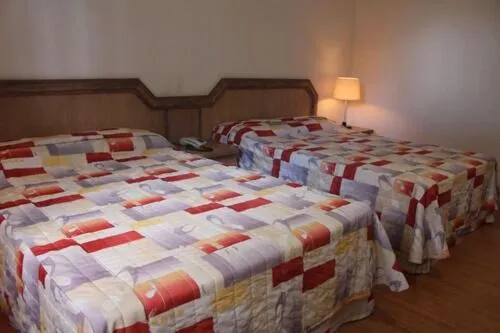 Bed in Paradies Hotel Express