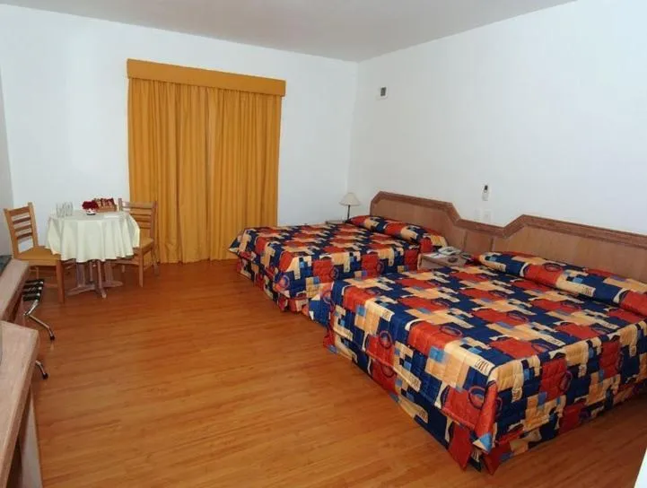 Bed in Paradies Hotel Express