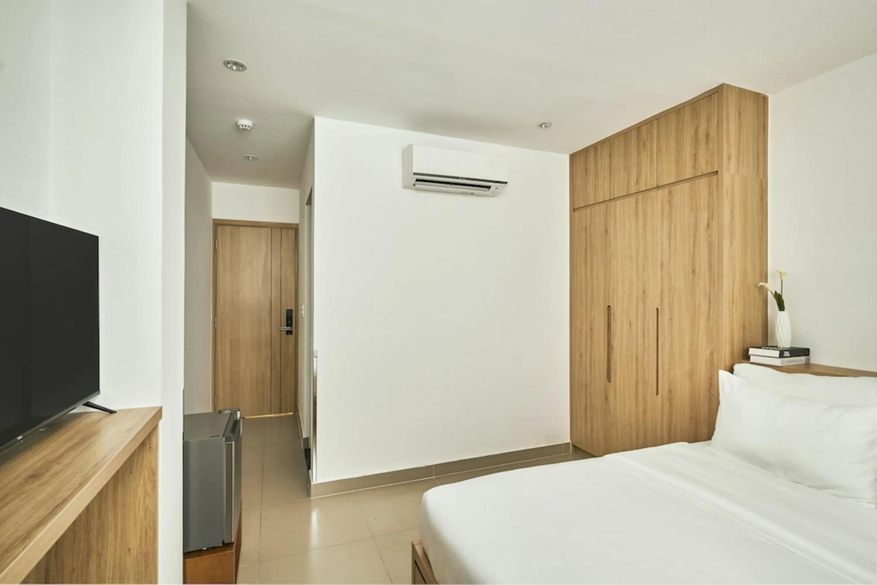 Bed in MIHN SUITES BEN THANH