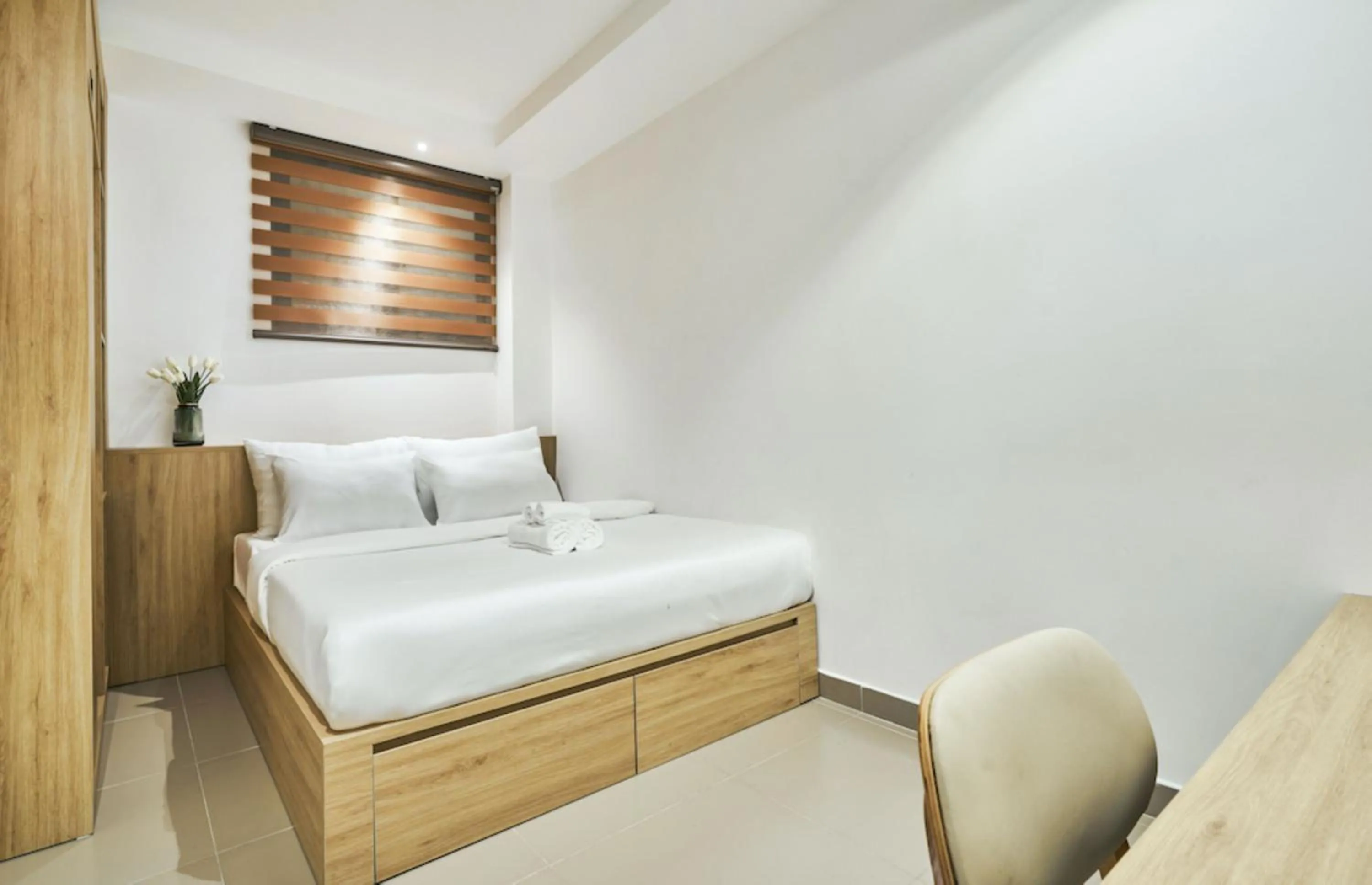 Bed in MIHN SUITES BEN THANH