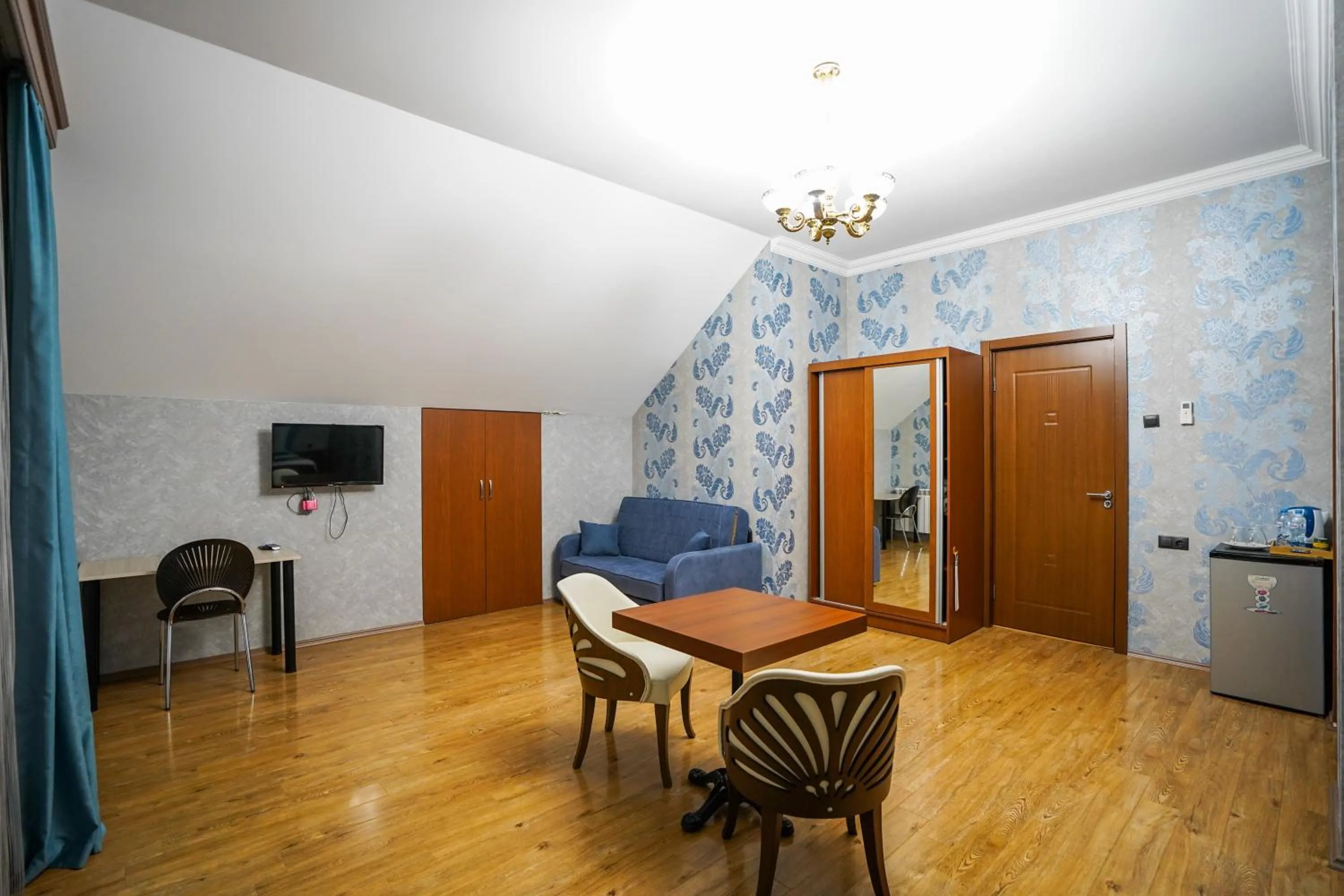 Communal lounge/ TV room in Natali Hotel