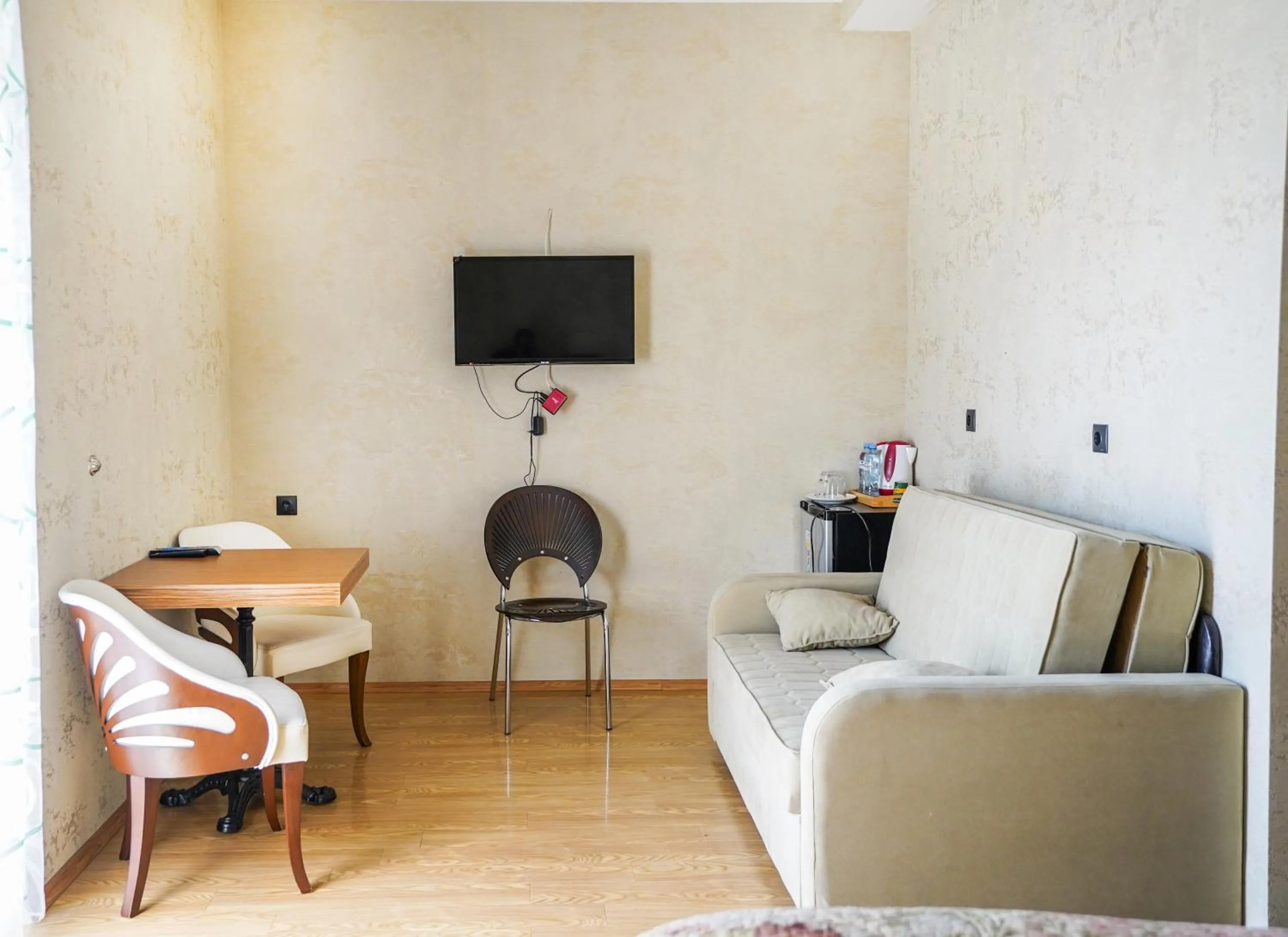 Communal lounge/ TV room in Natali Hotel