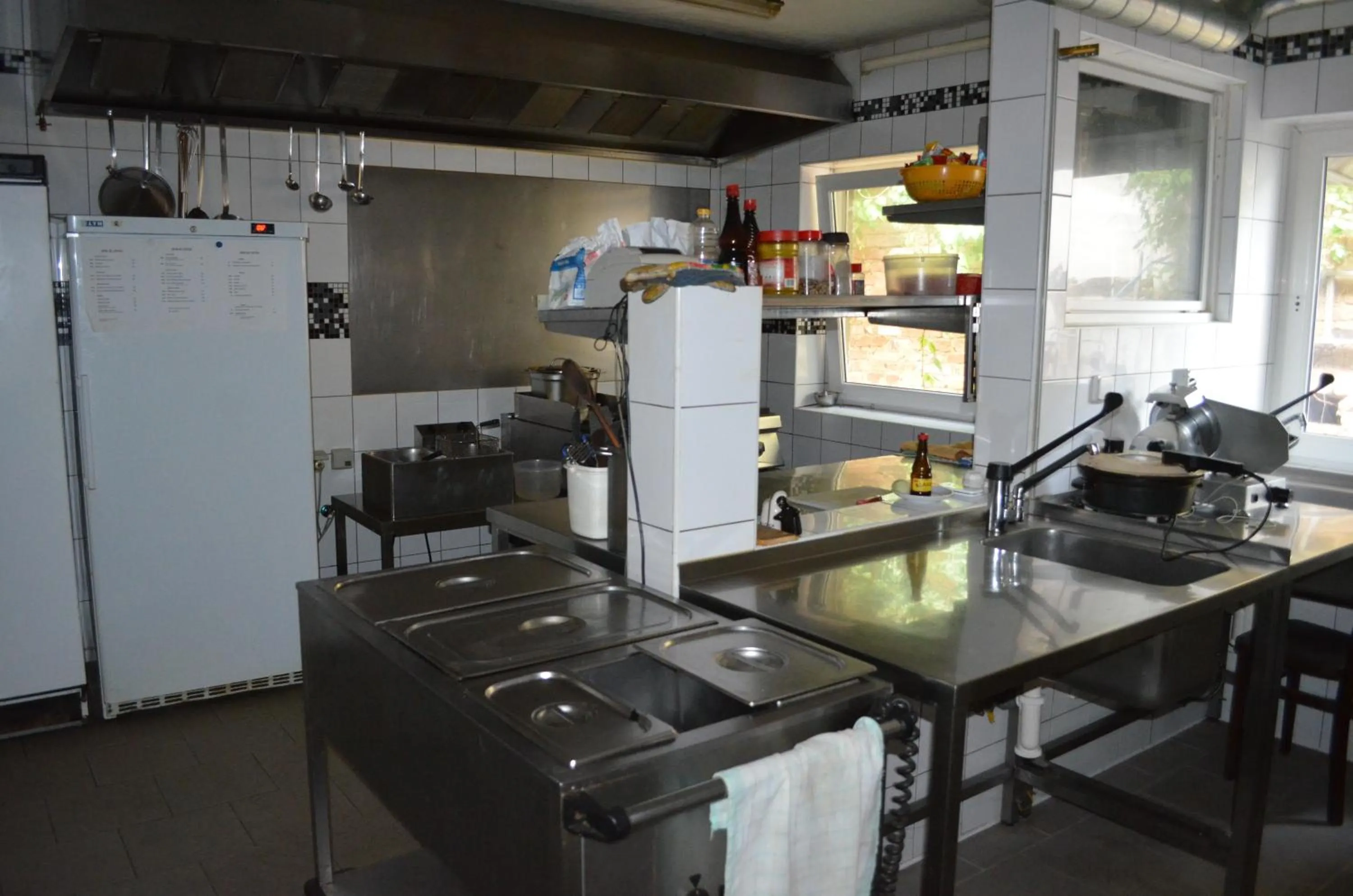 Kitchen or kitchenette in Pension Egida