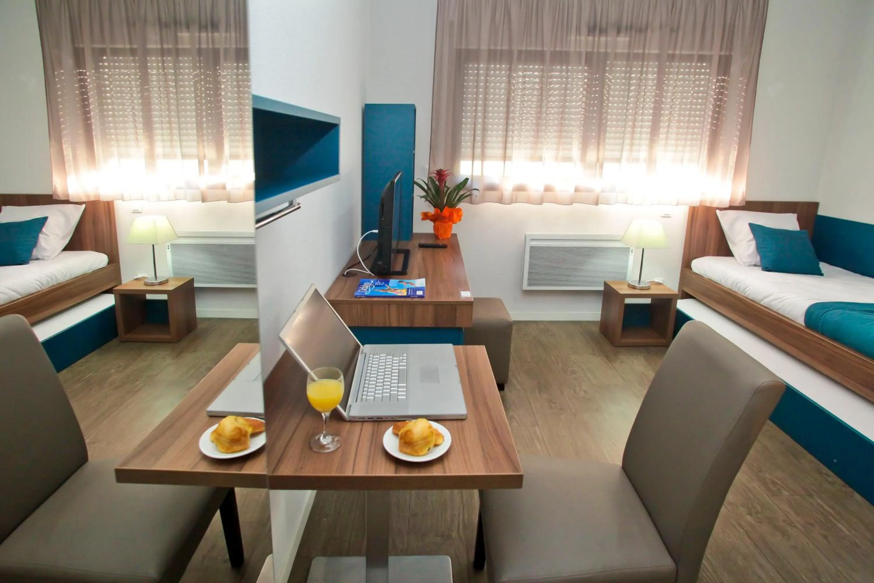 Seating area, Bed in Appart Hotel Odalys City Tours Le Jardin des Lettres