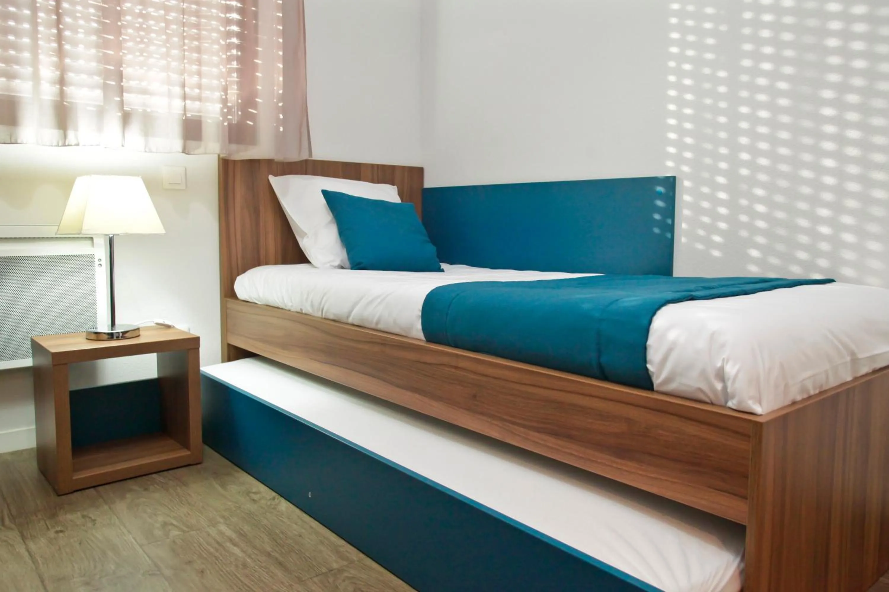 Living room, Bed in Appart Hotel Odalys City Tours Le Jardin des Lettres