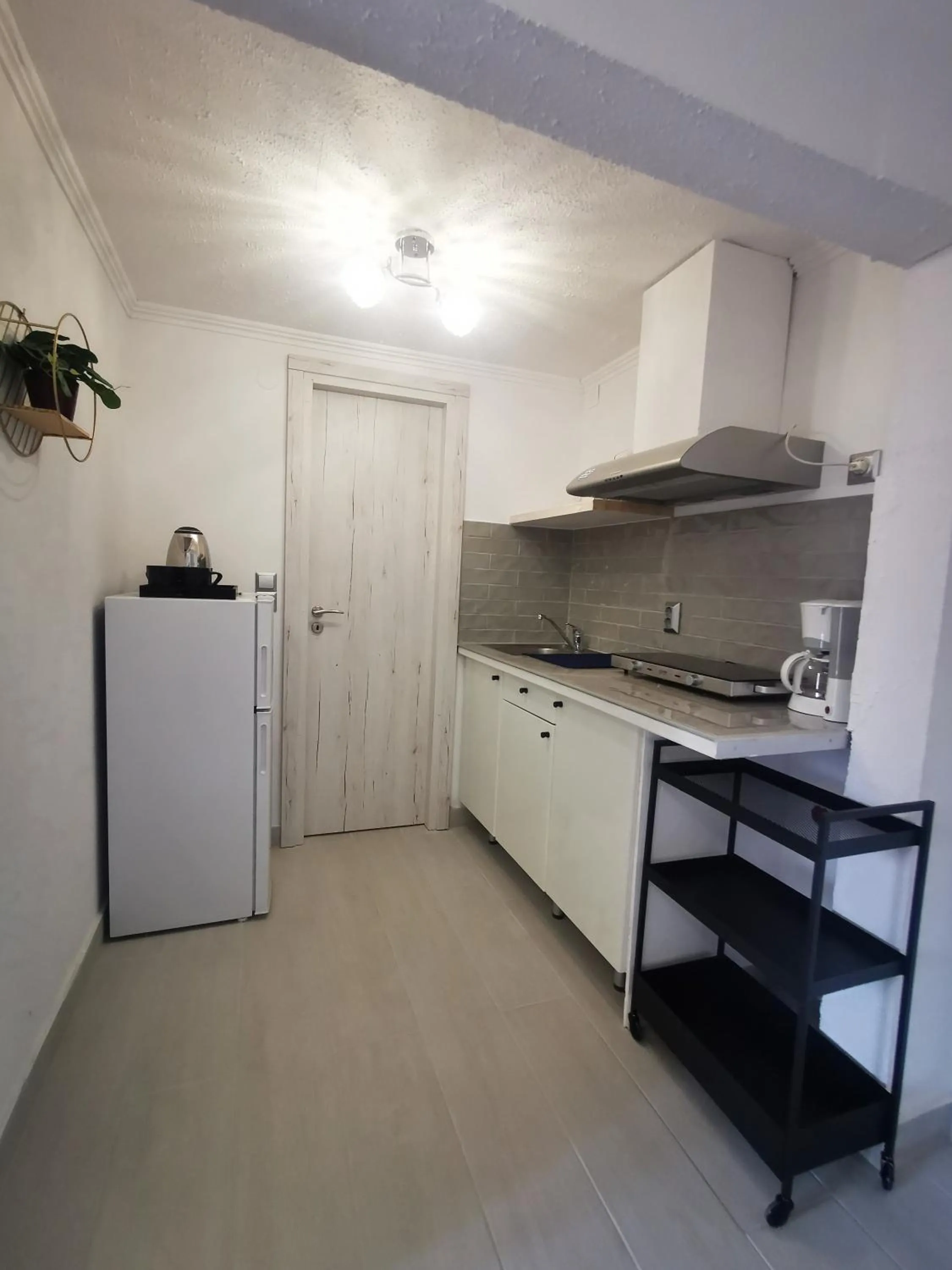 Kitchen or kitchenette in Anthis Studios