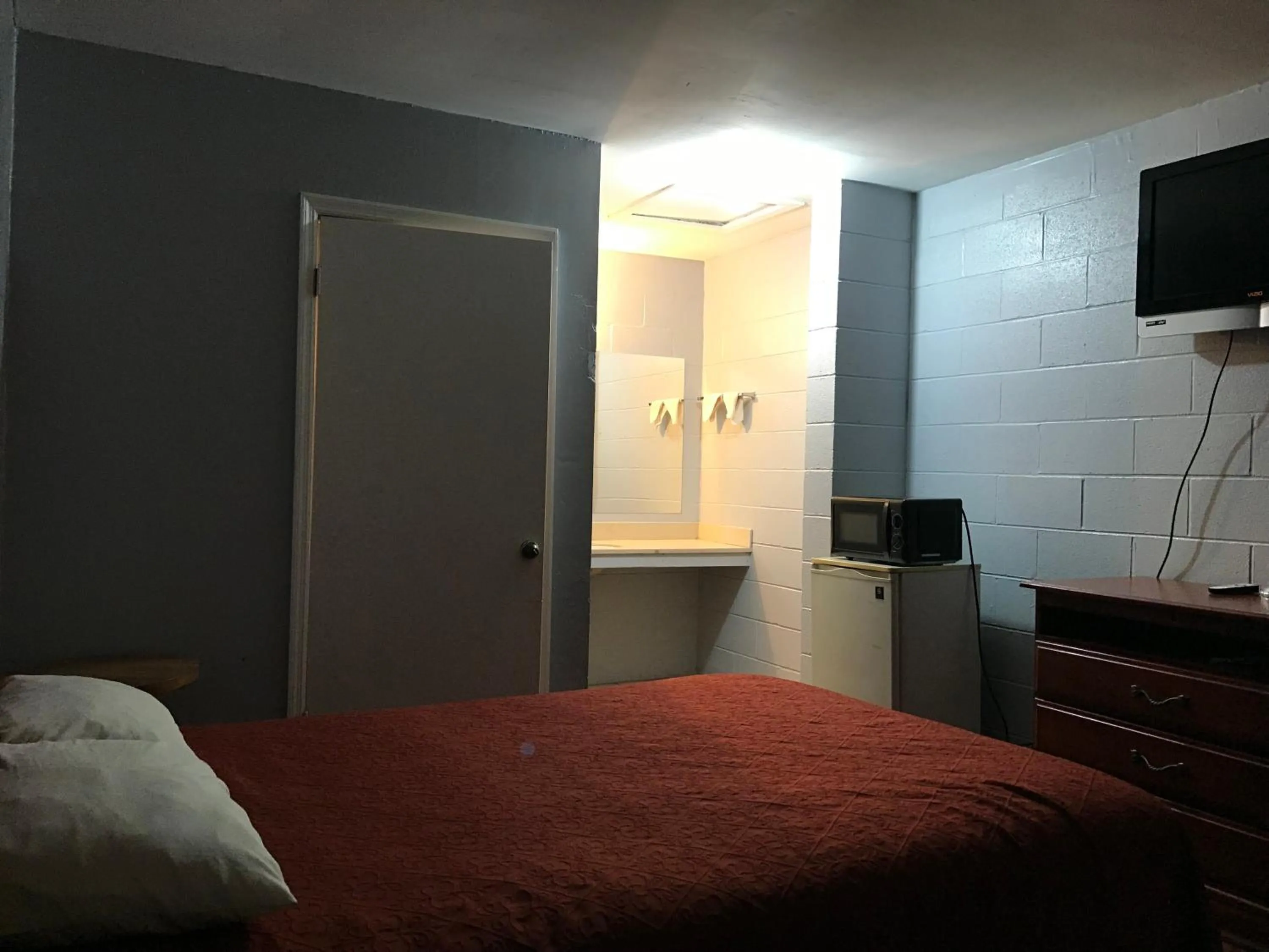 Bed in Sky Inn Hotel