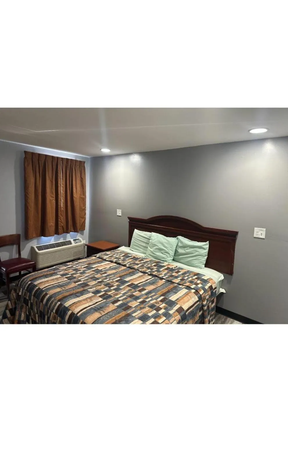 Bed in Sky Inn Hotel