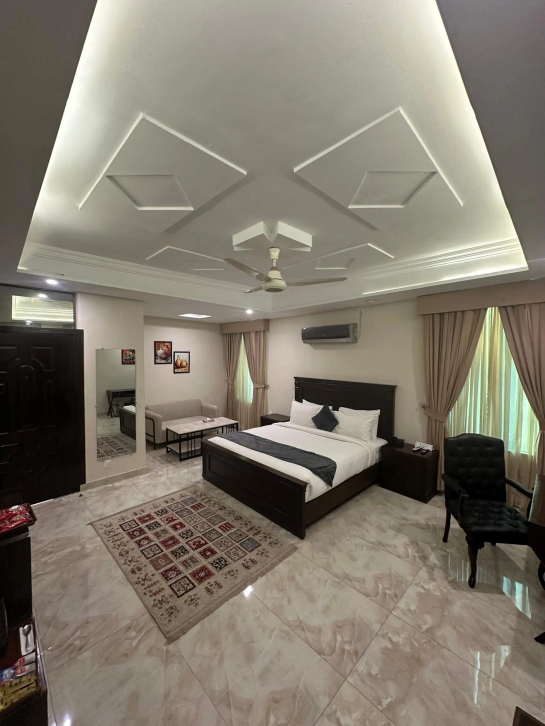 Photo of the whole room, Bed in Burj Ul Zaki