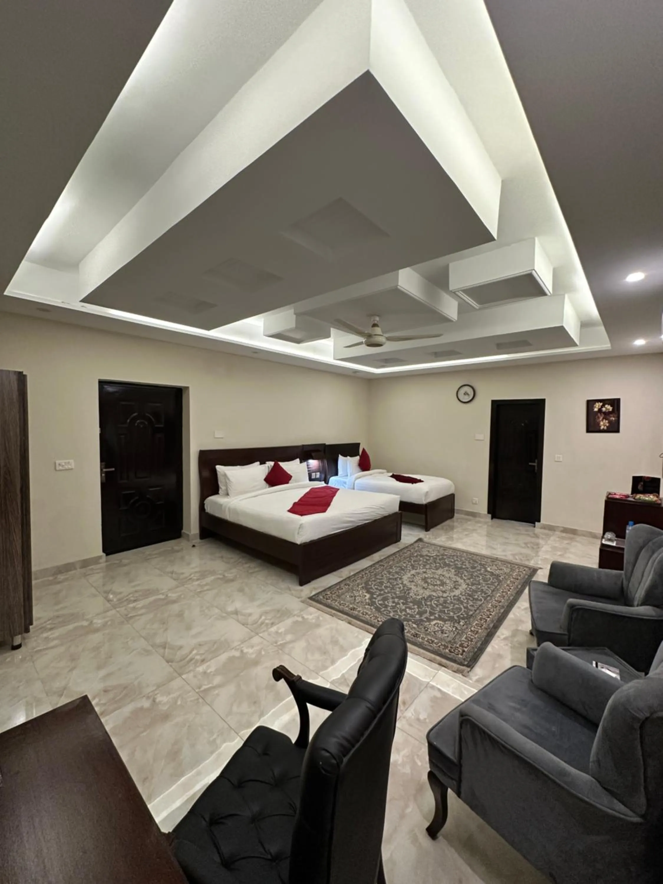 Photo of the whole room, Bed in Burj Ul Zaki