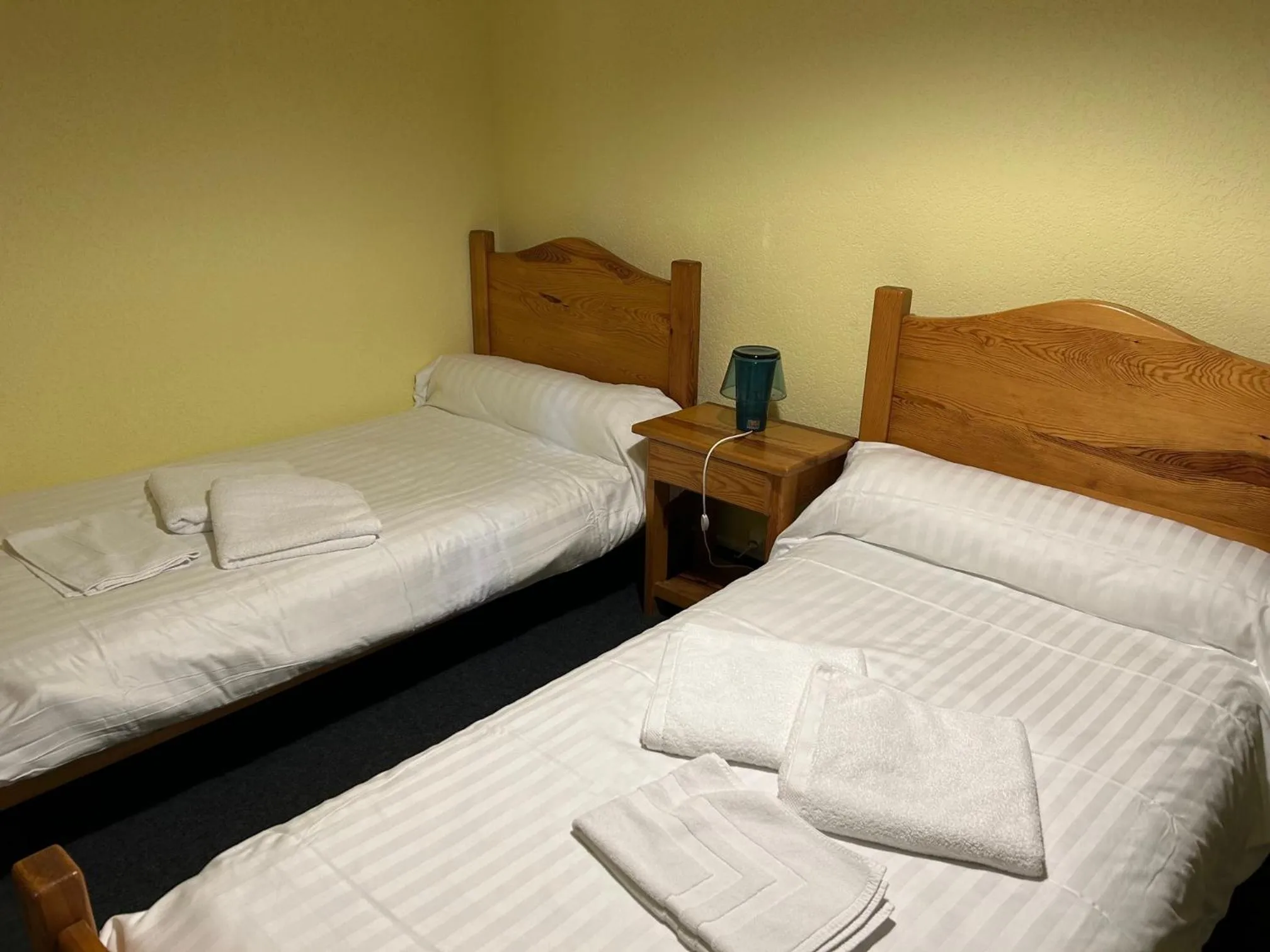 Bed in AUX GLOBE-TROTTERS