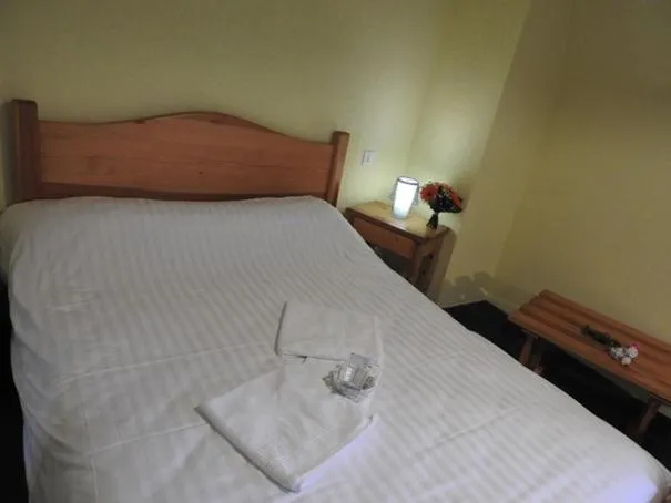 Bed in AUX GLOBE-TROTTERS