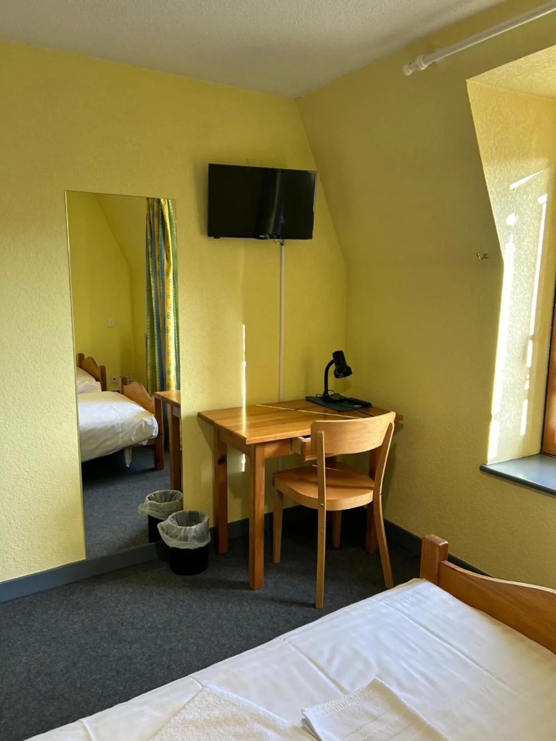 Bed in AUX GLOBE-TROTTERS