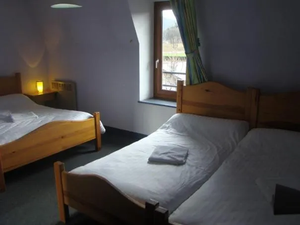 Bed in AUX GLOBE-TROTTERS