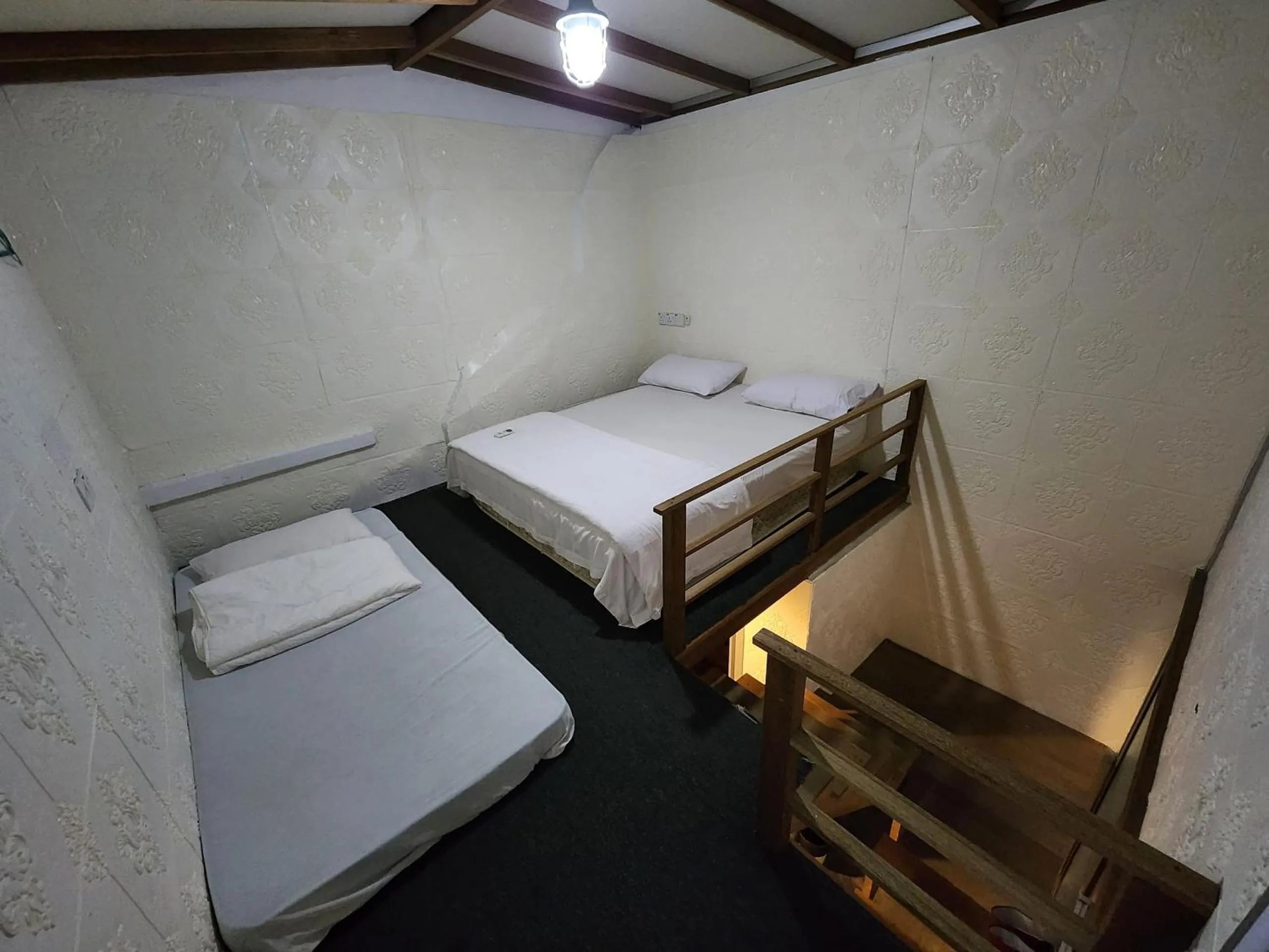 Bed in Dou Houz Georgetown