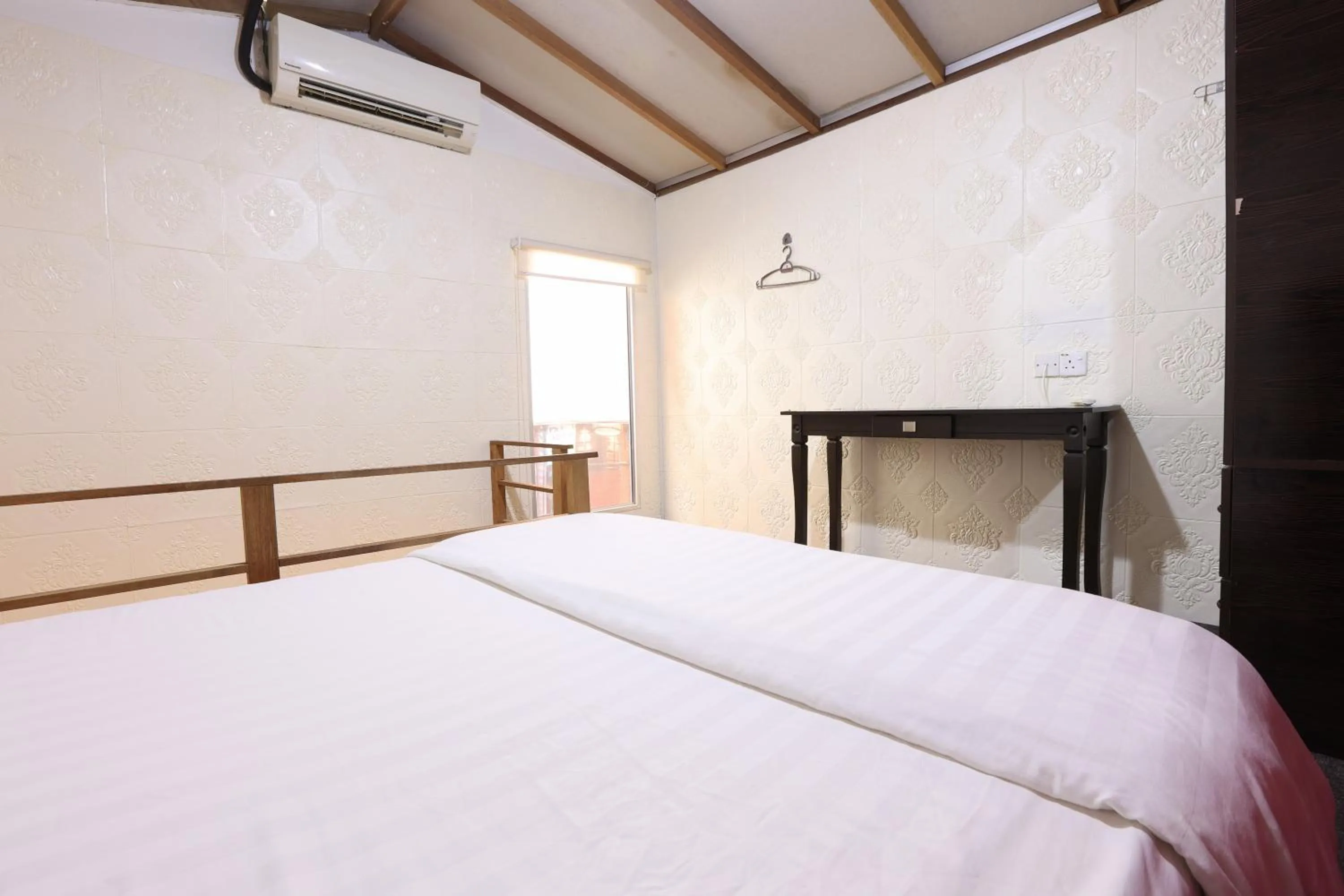 Bed in Dou Houz Georgetown