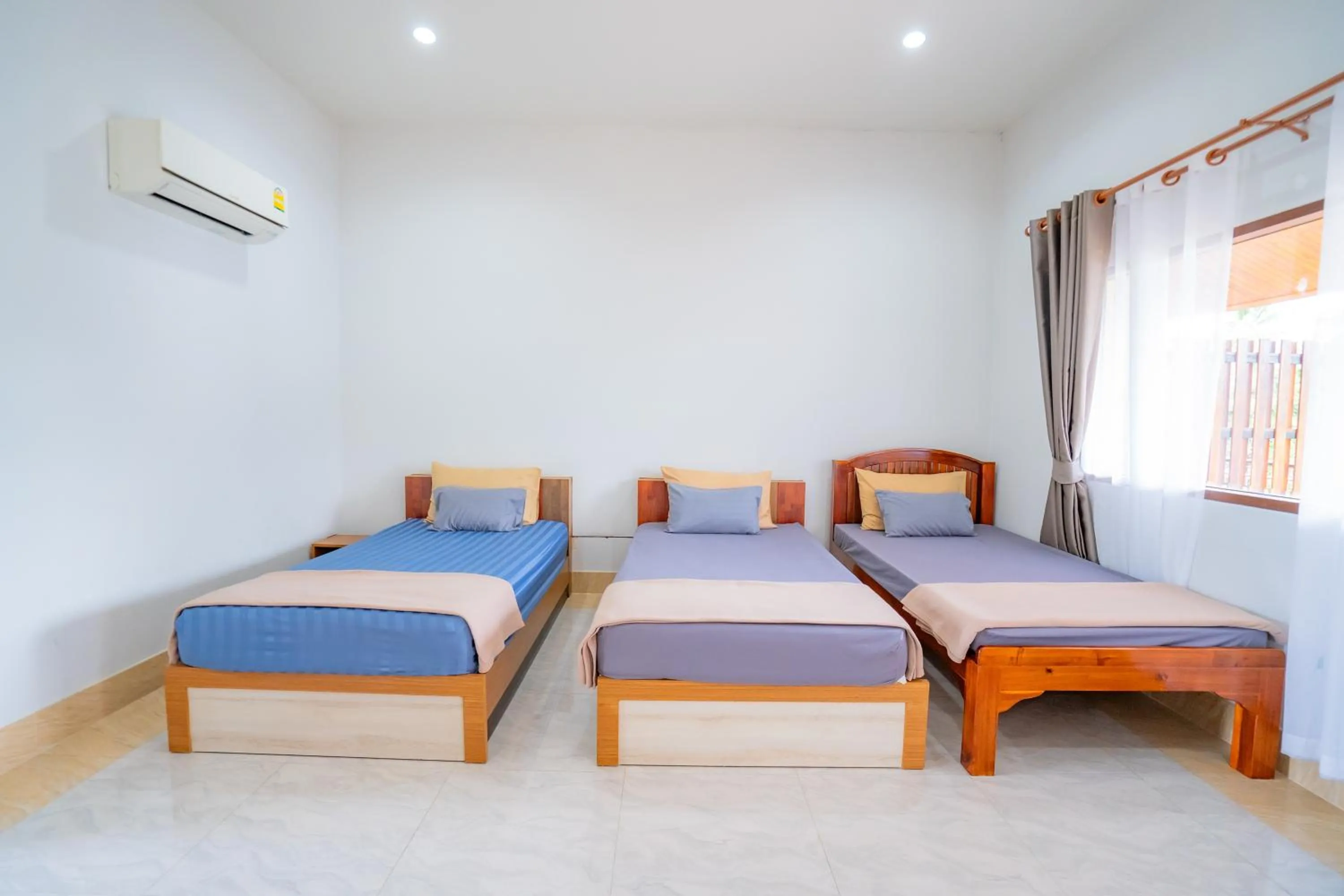 Bed in Ban Suan Bang Toei Homestay