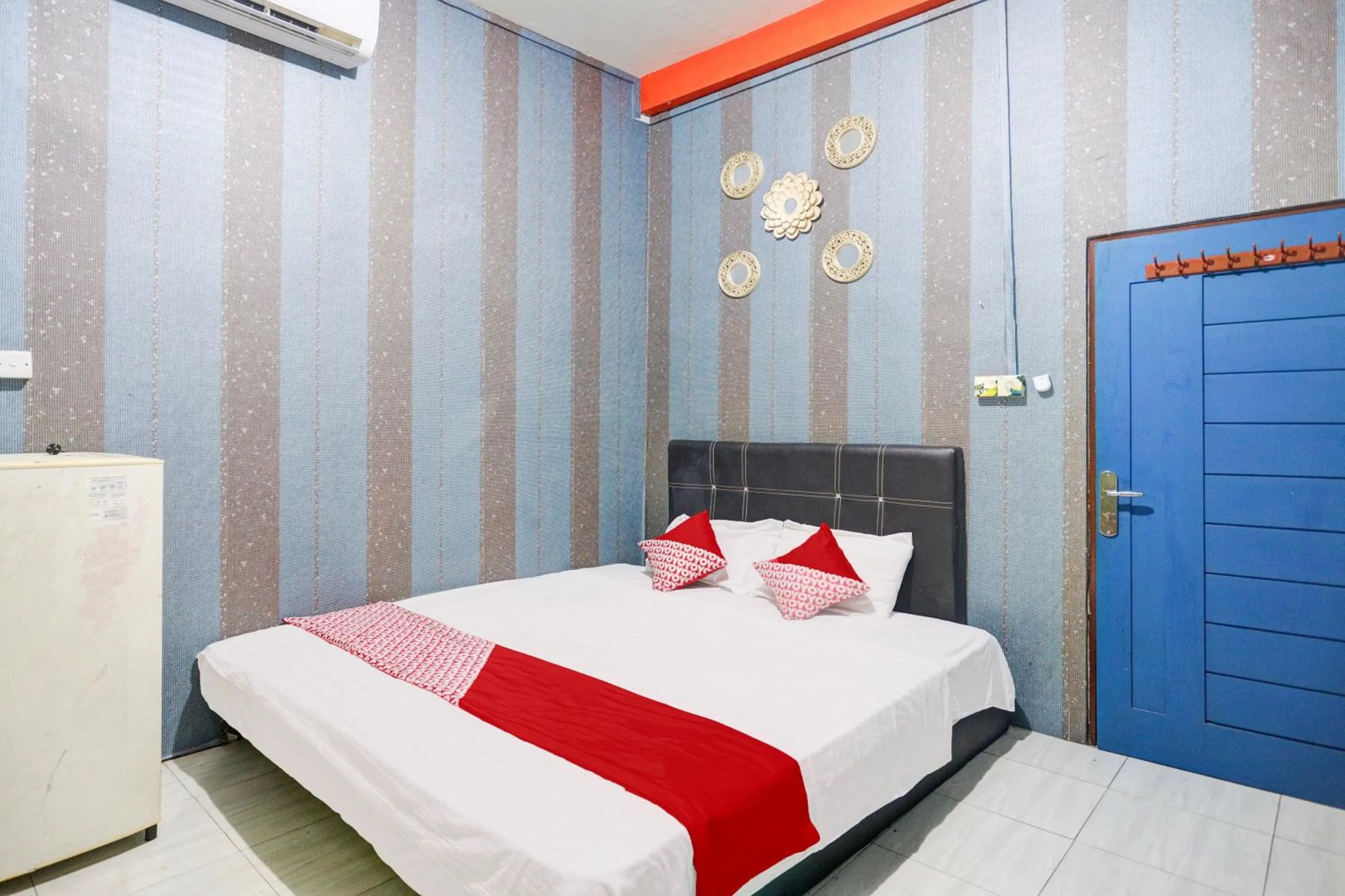 Bedroom, Bed in Hotel O Penginapan Pelangi