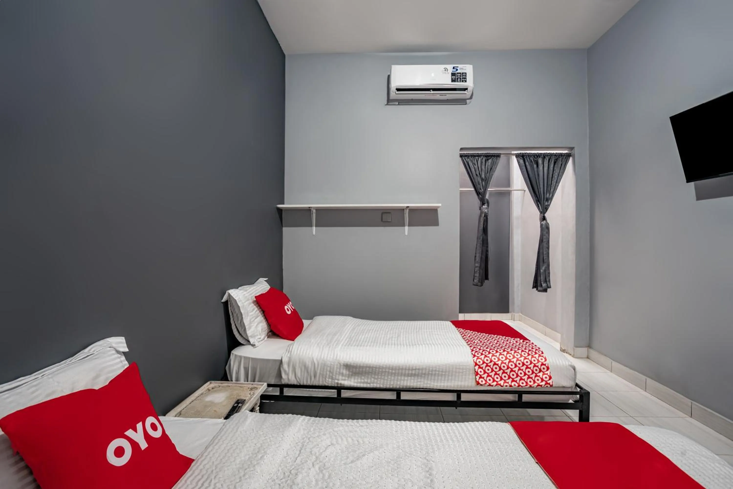 Bedroom in SUPER OYO Gandaria Guest House Near Masjid Raya Sumatera Barat