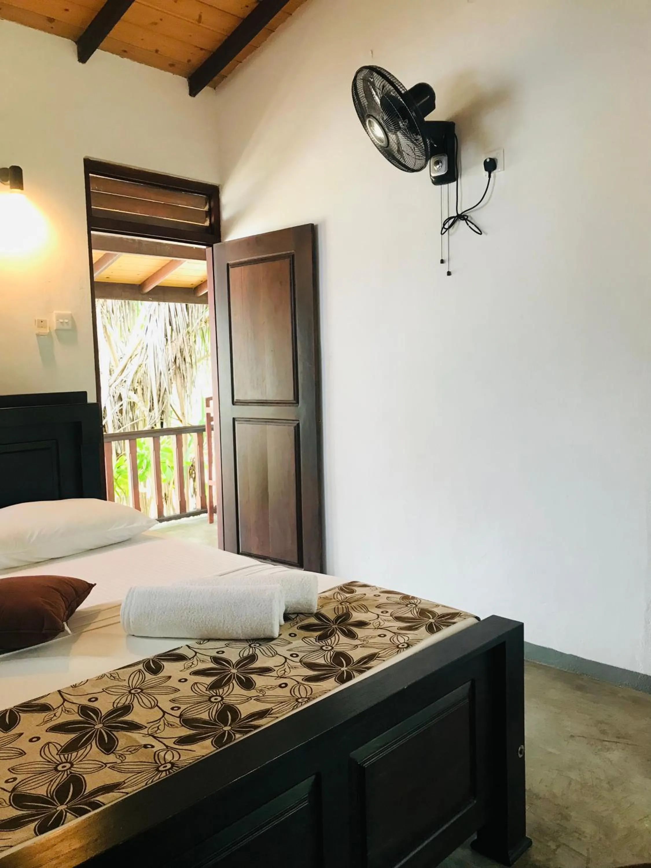 Bed in Ganesh Garden Beach Cabanas