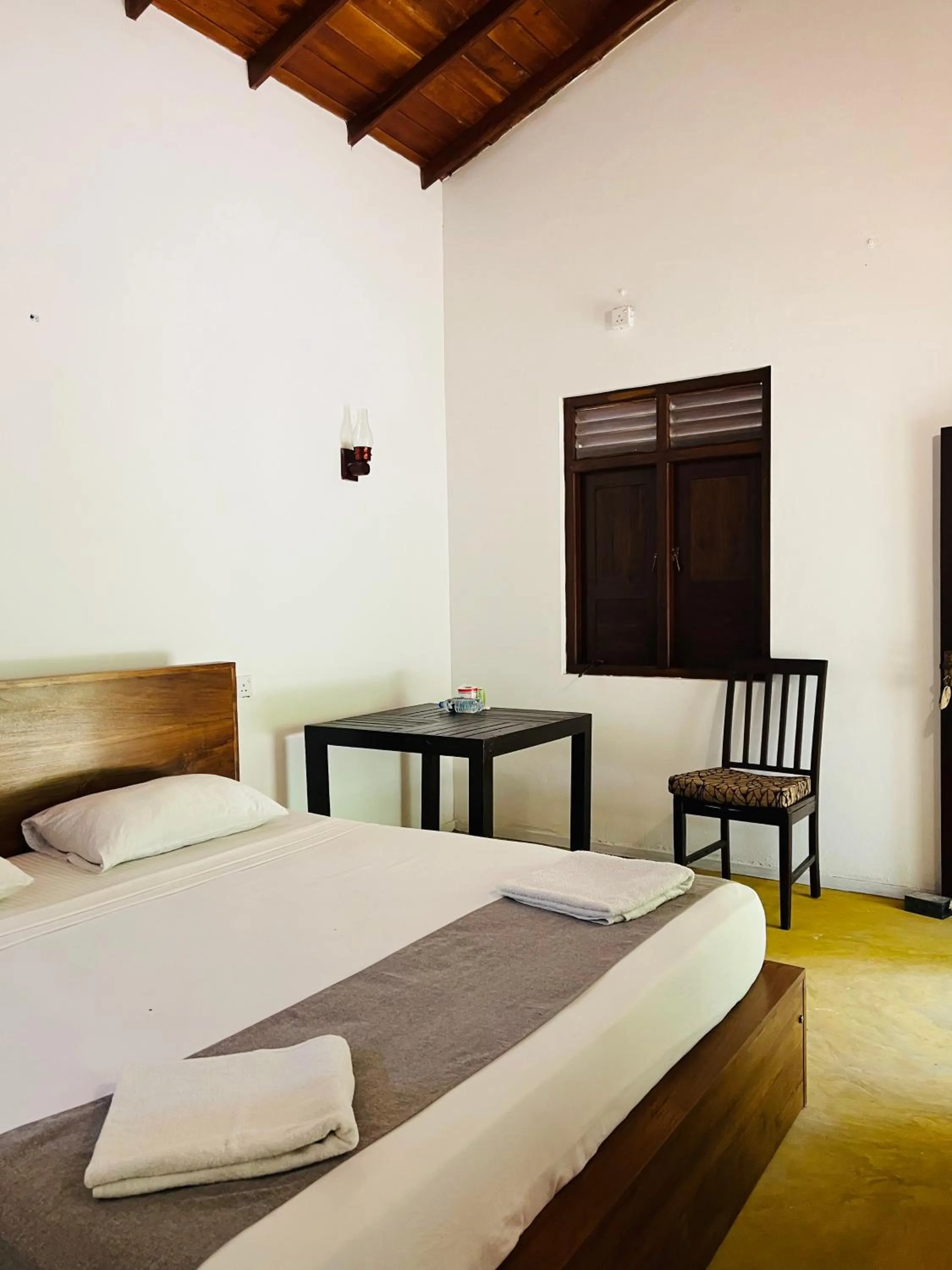 Bed in Ganesh Garden Beach Cabanas