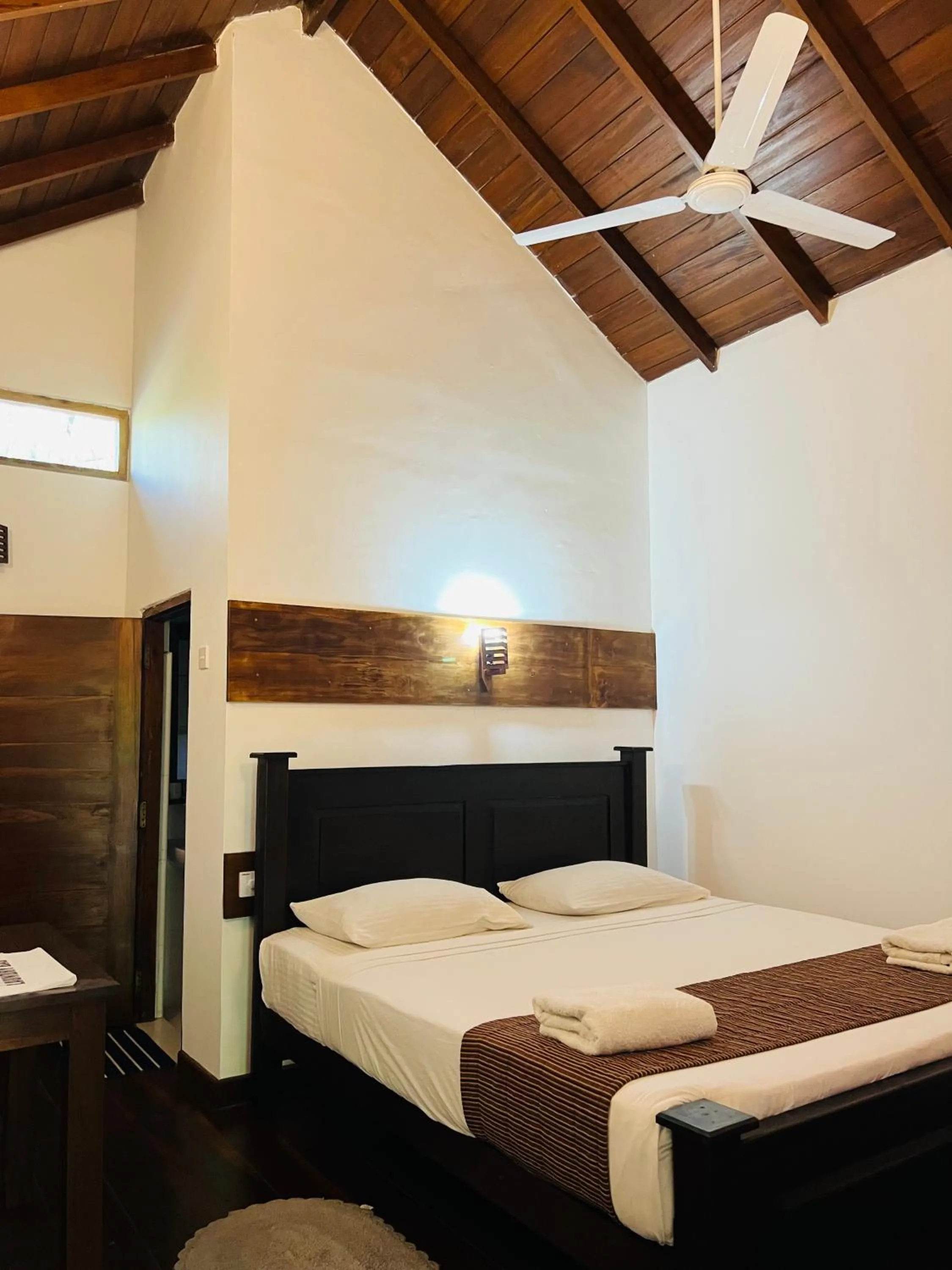 Bed in Ganesh Garden Beach Cabanas