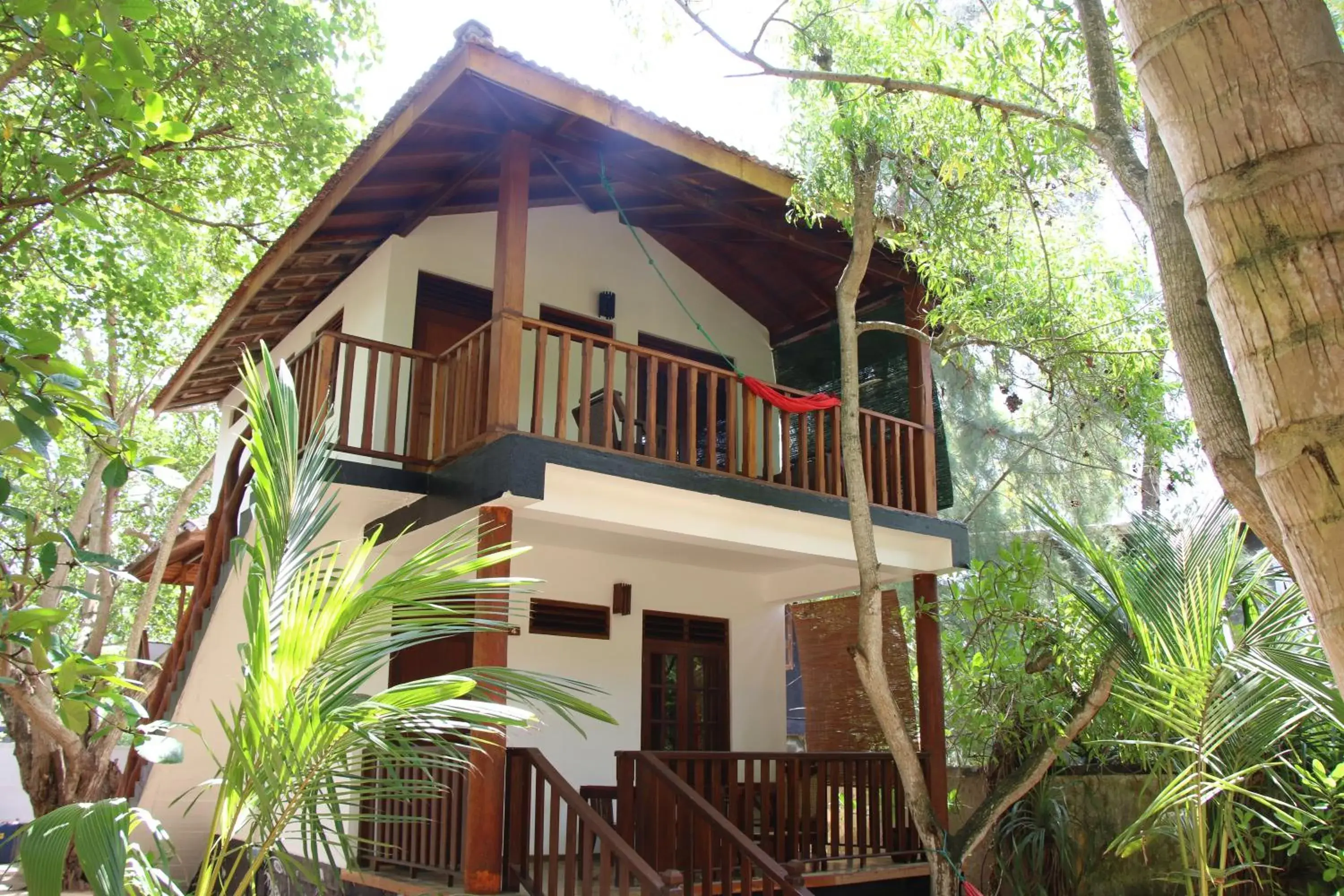 Deluxe Triple Room in Ganesh Garden Beach Cabanas Deluxe Triple Room in Ganesh Garden Beach Cabanas