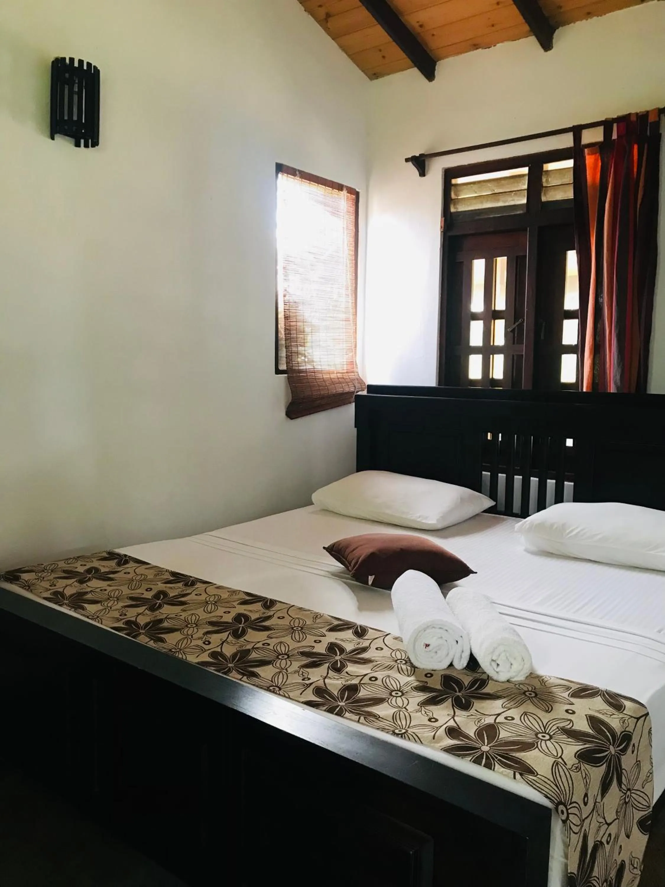 Bed in Ganesh Garden Beach Cabanas