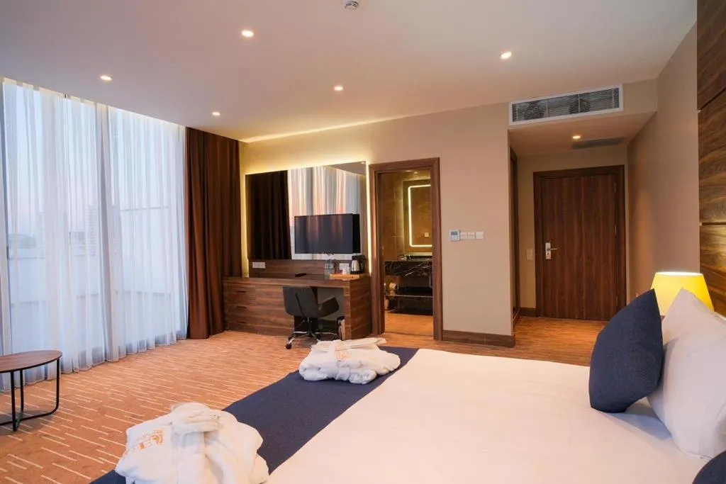 Bed in Ekor Elegance Hotel