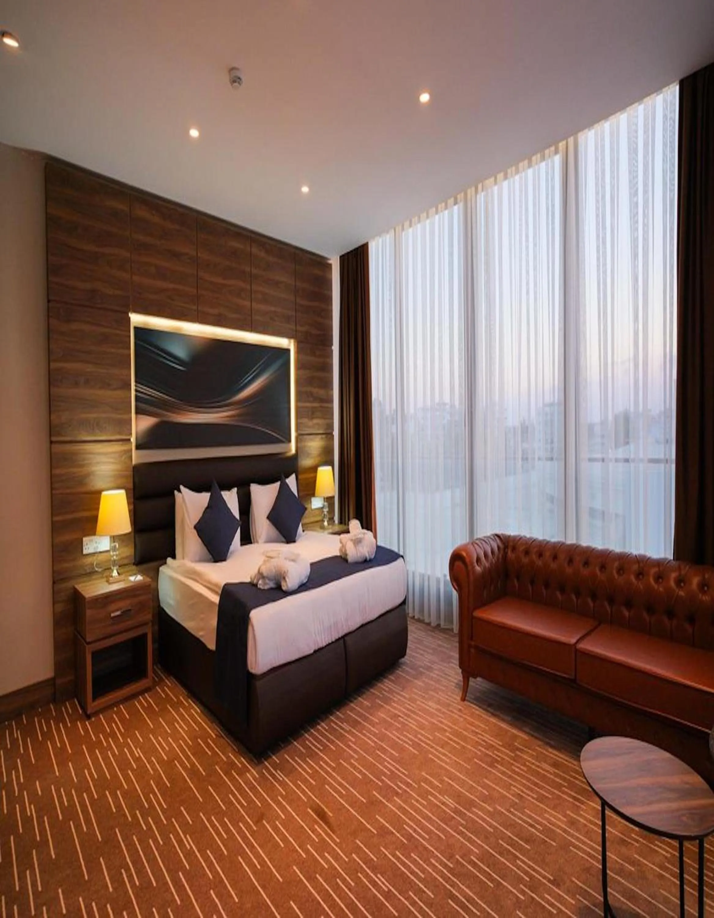 Bed in Ekor Elegance Hotel