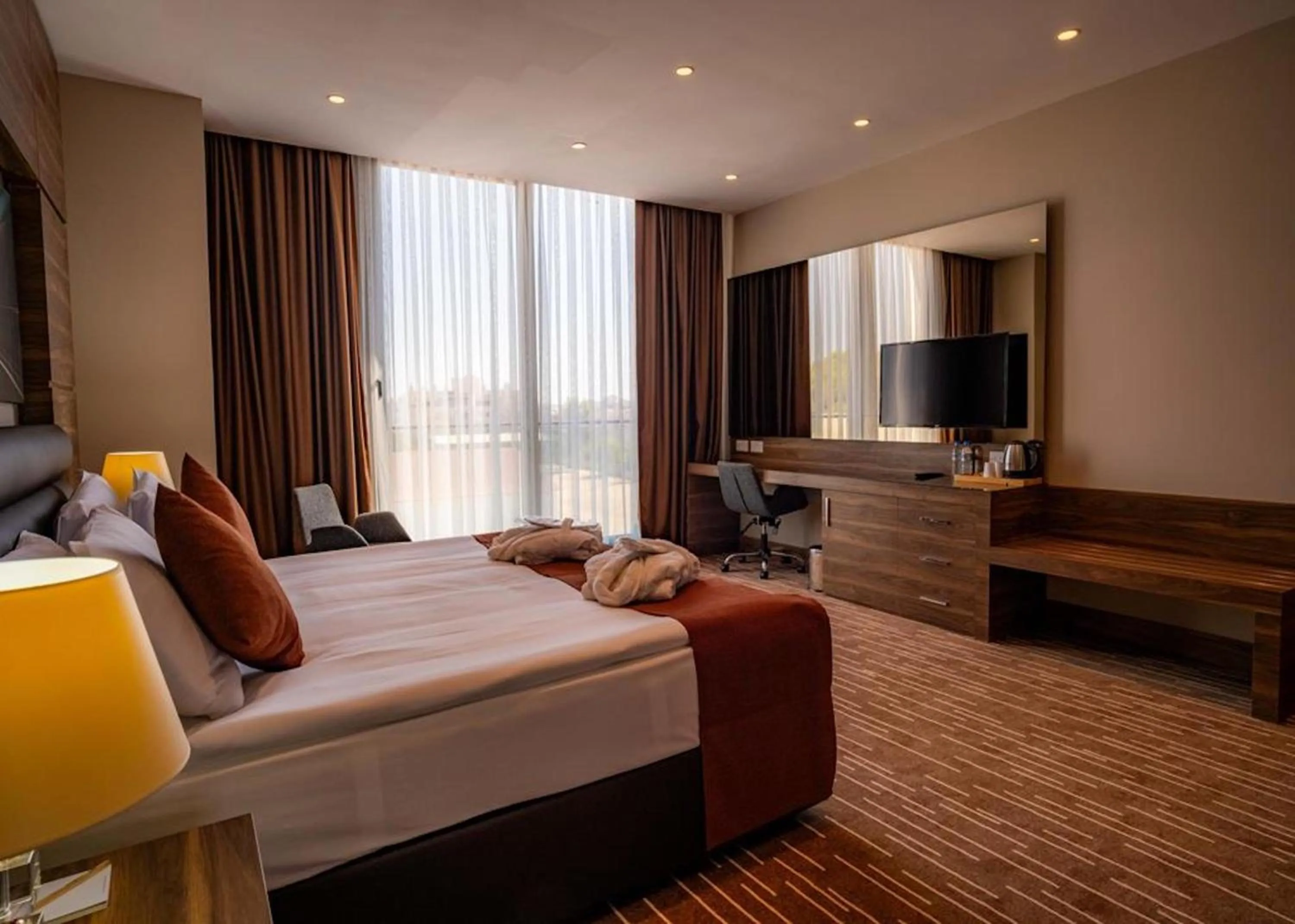 Bed in Ekor Elegance Hotel