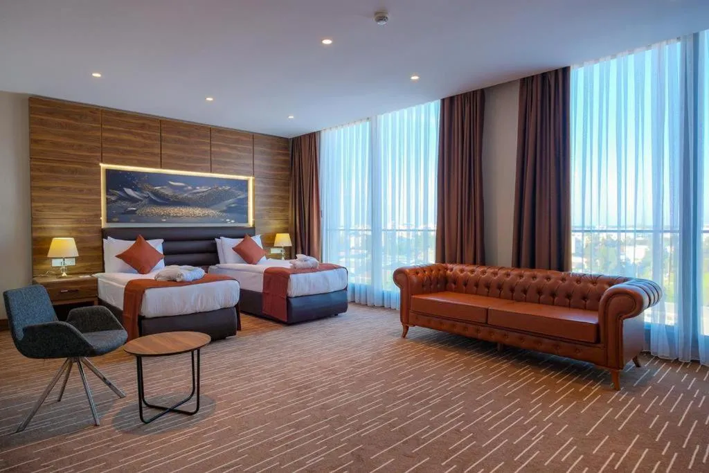 Bed in Ekor Elegance Hotel