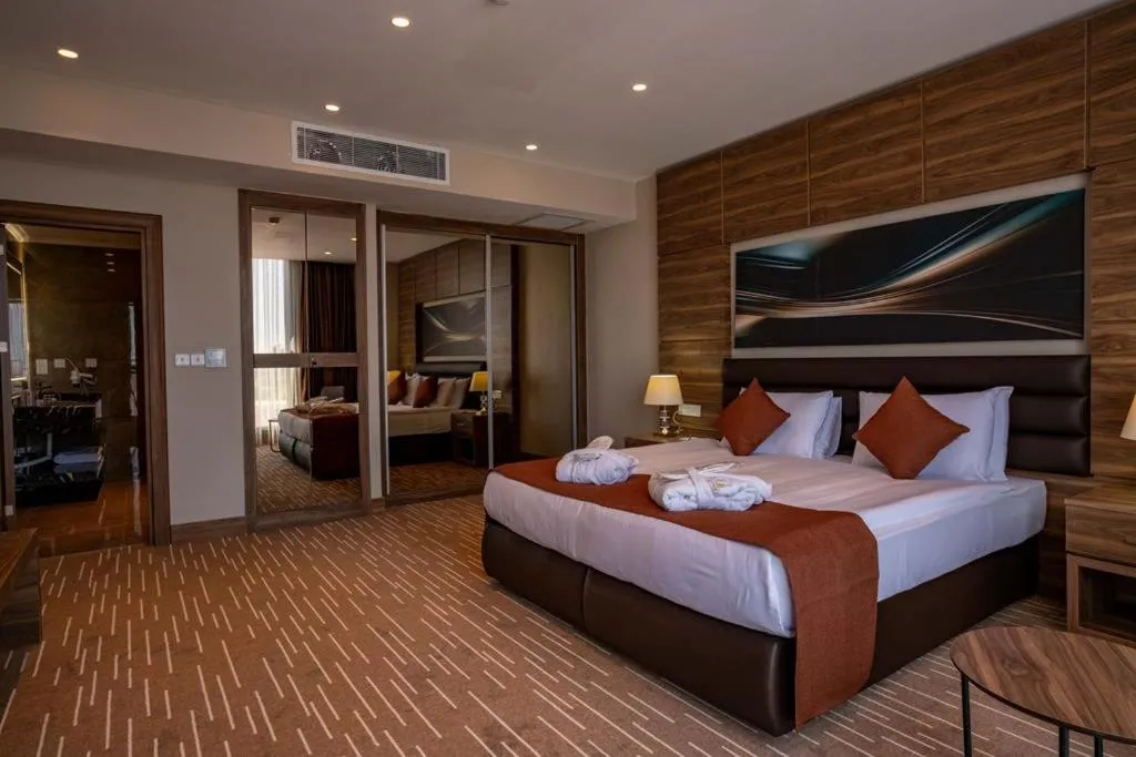 Bed in Ekor Elegance Hotel