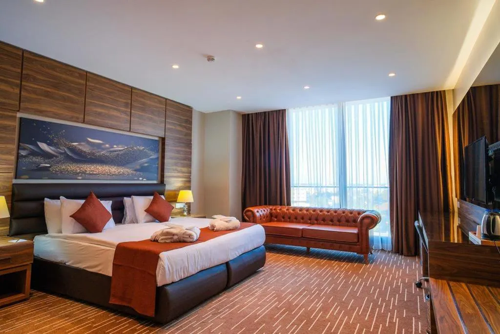 Bed in Ekor Elegance Hotel