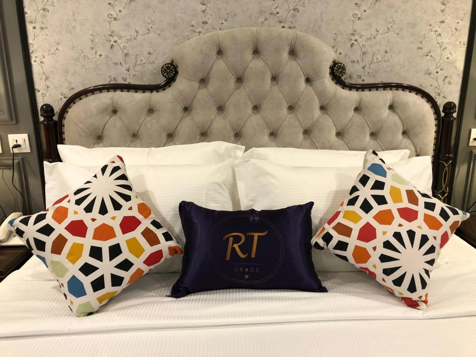 Bed in RT Grace Royal Taj Hotel Sukkur
