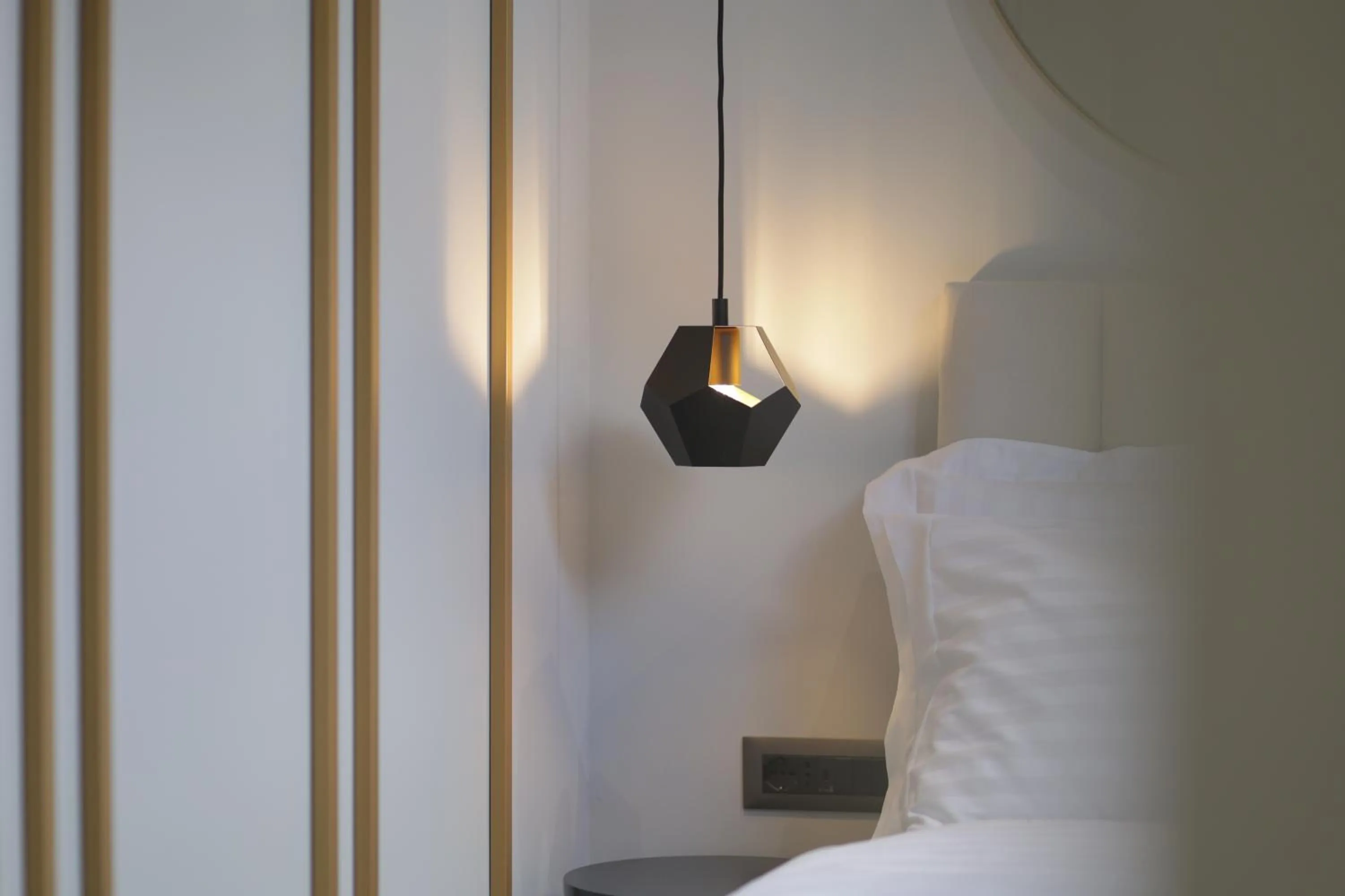 Bed in Gremmy Boutique Hotel