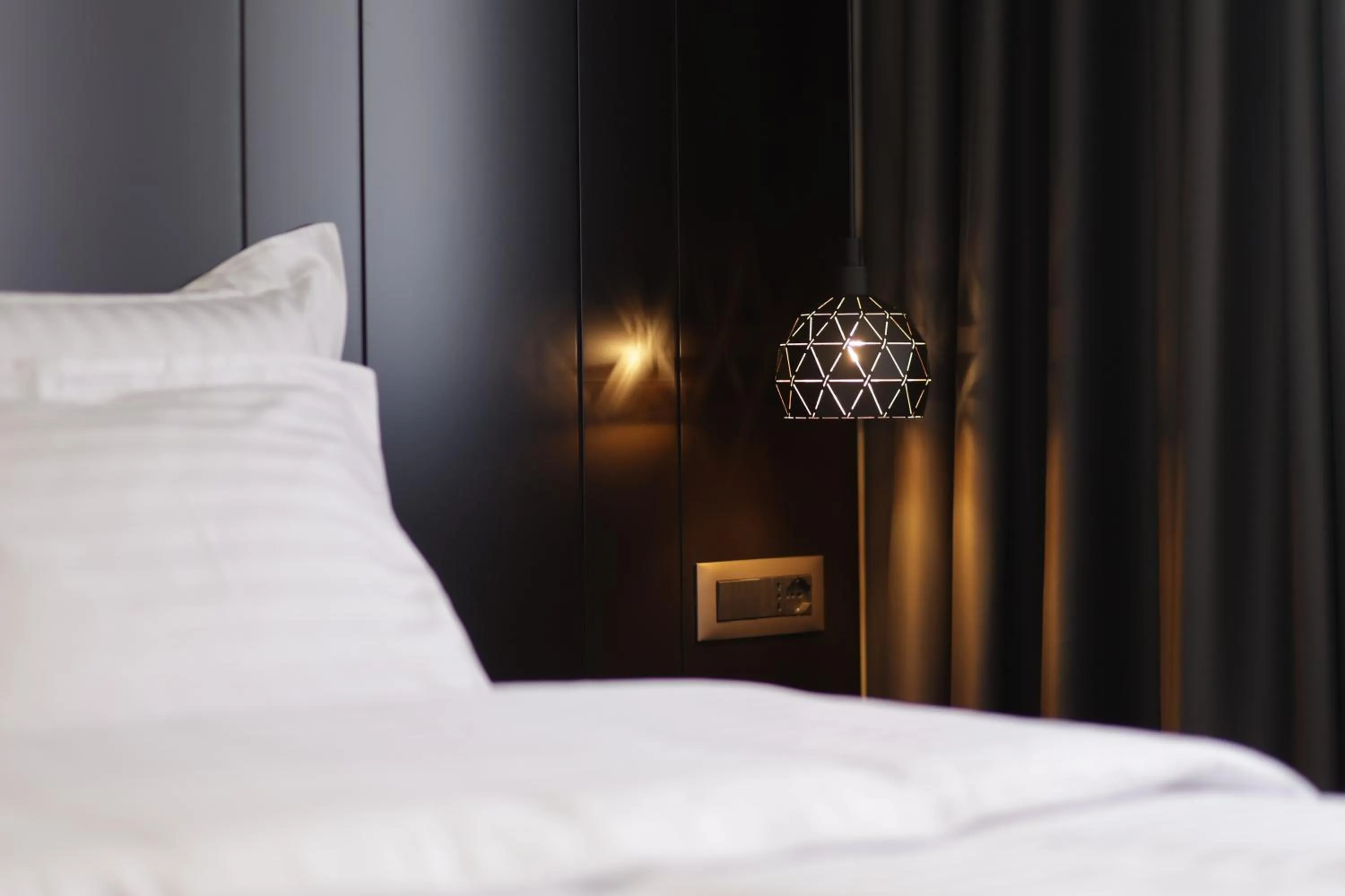 Bed in Gremmy Boutique Hotel