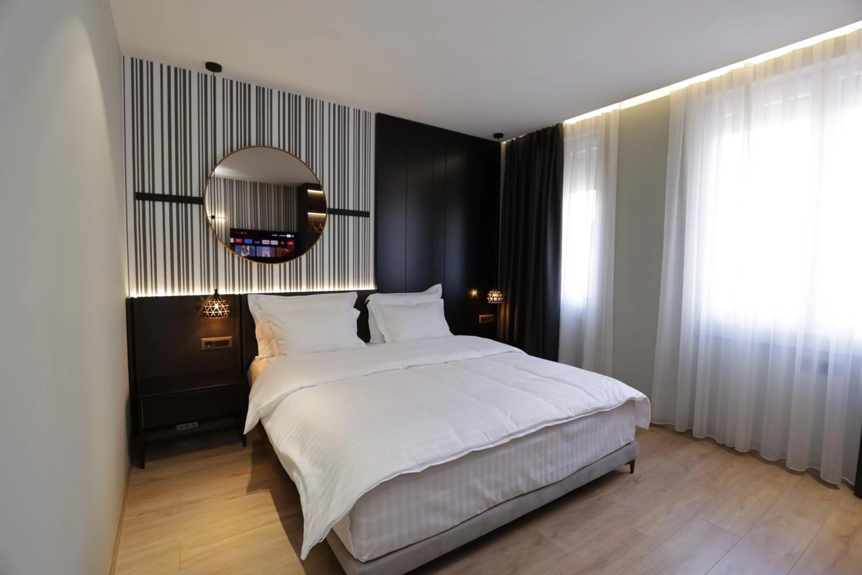 Bed in Gremmy Boutique Hotel