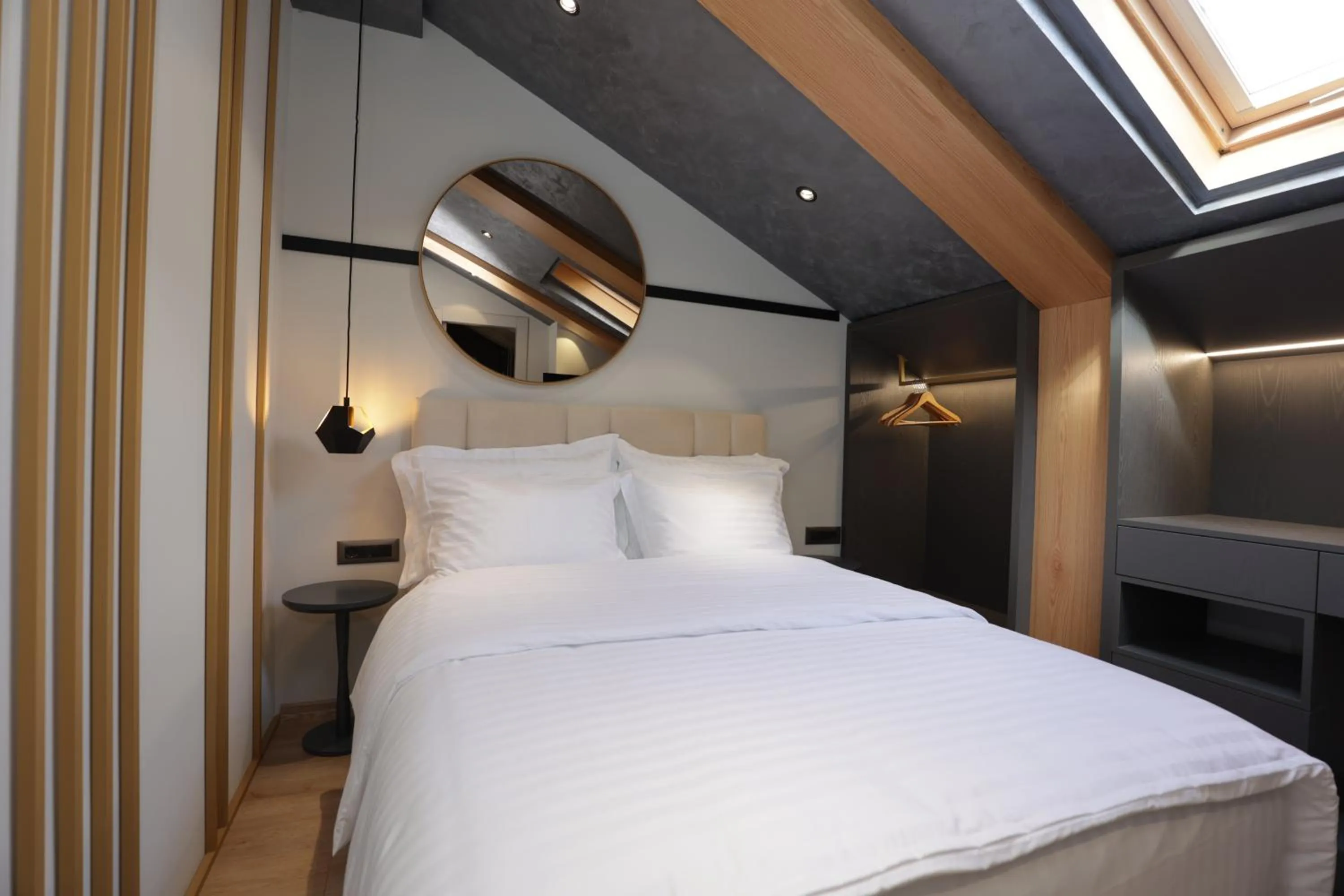 Bed in Gremmy Boutique Hotel