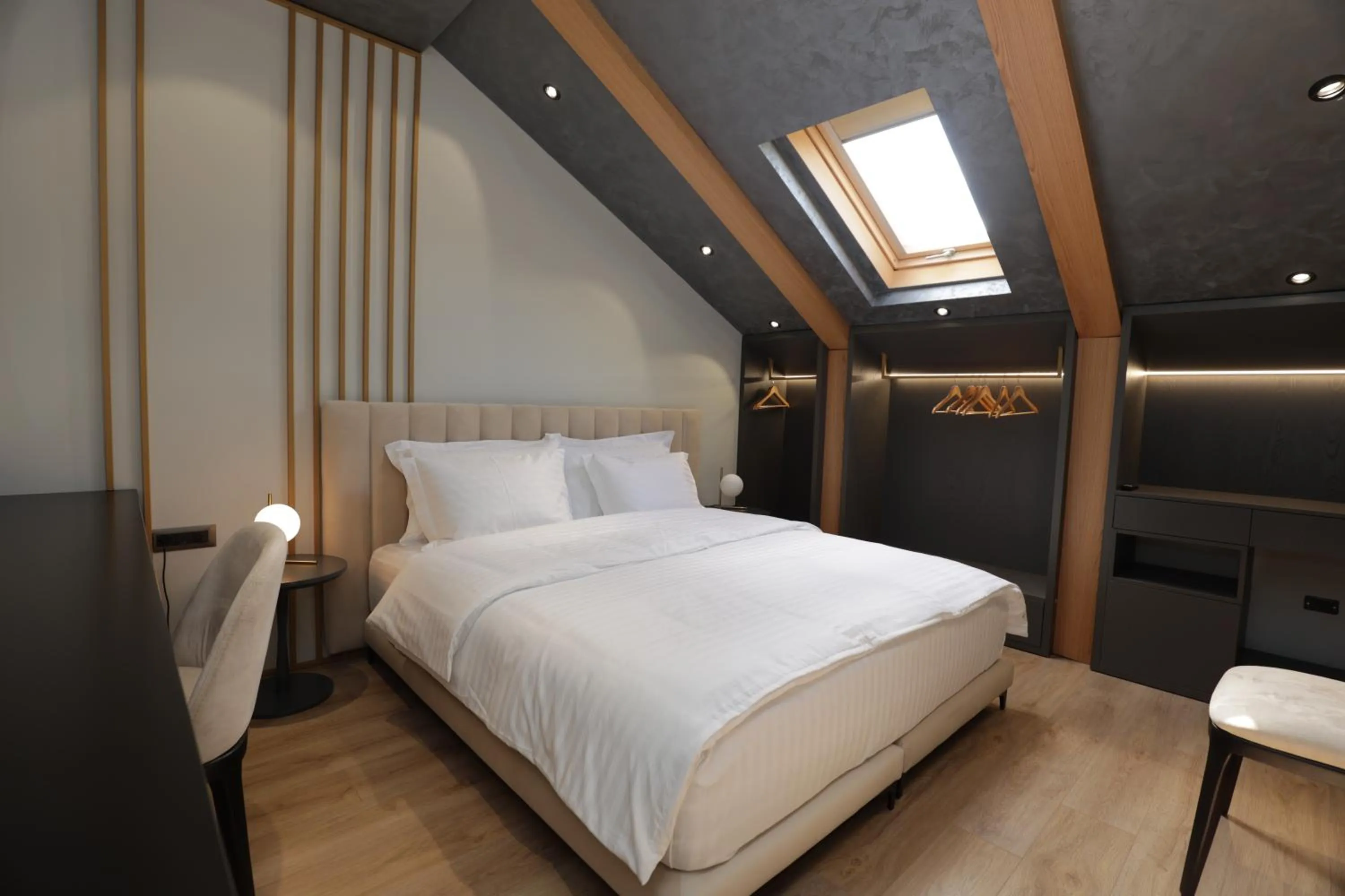 Bed in Gremmy Boutique Hotel