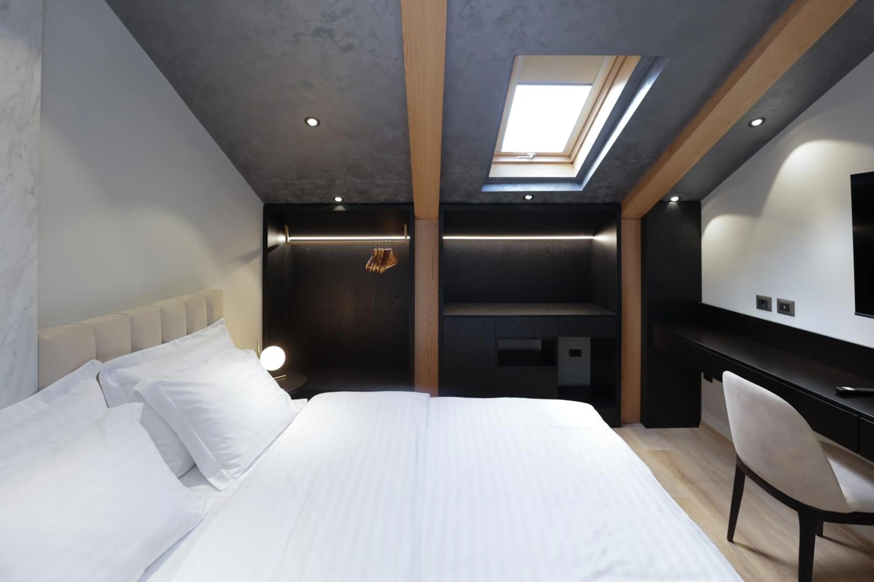 Bed in Gremmy Boutique Hotel