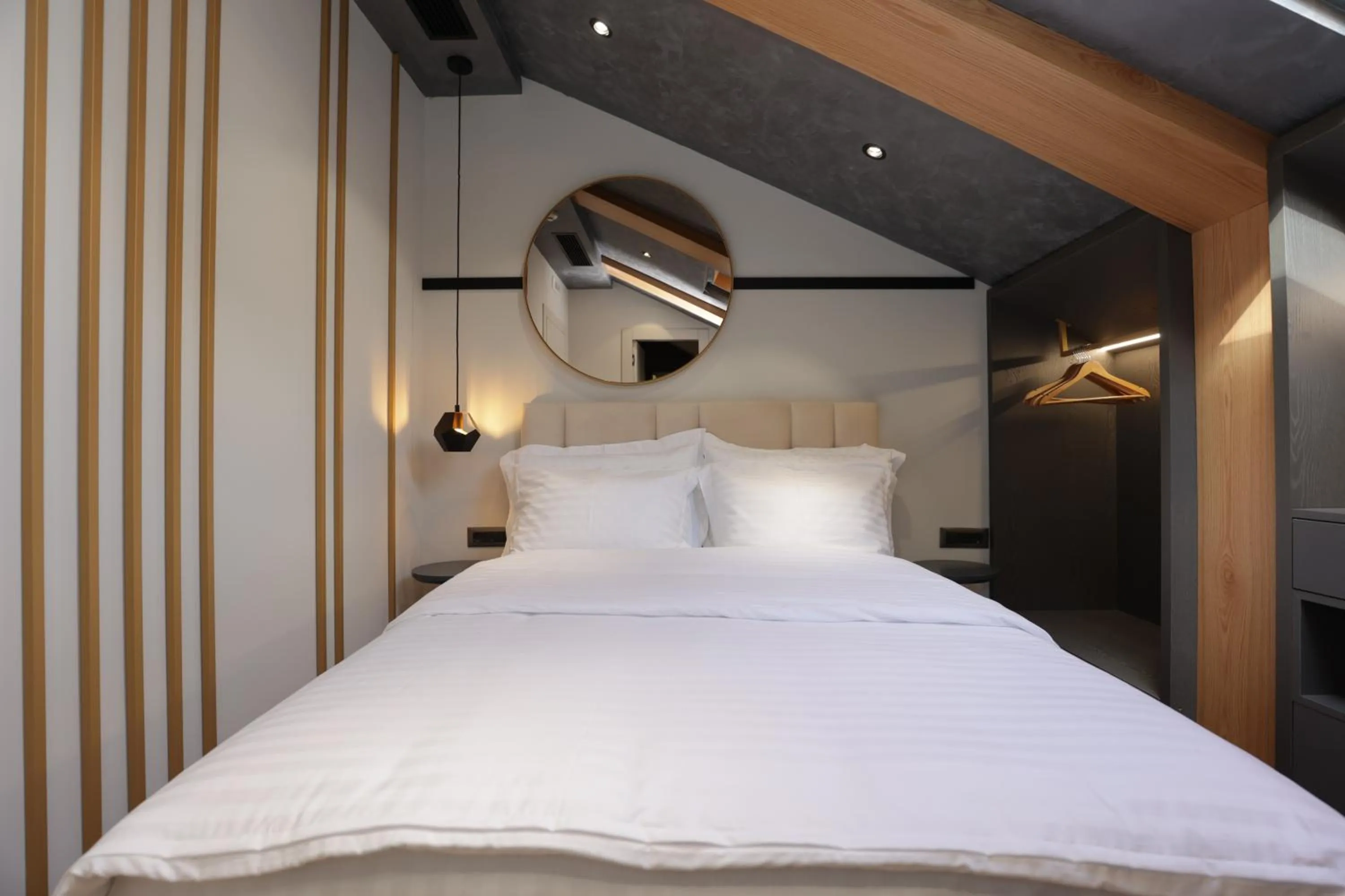 Bed in Gremmy Boutique Hotel