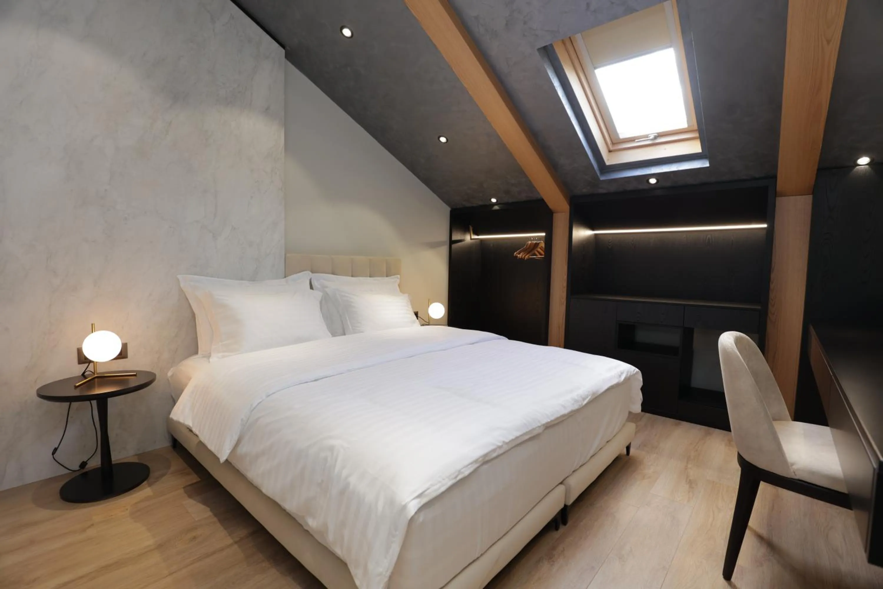 Bed in Gremmy Boutique Hotel